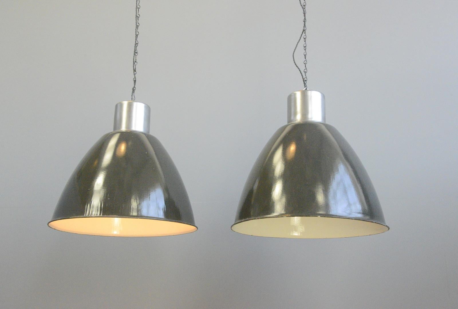 Czech XL Industrial pendant lights Circa 1950s

- Vitreous black enamel shades
- Brushed steel tops
- Takes E27 fitting bulbs
- Comes with 120cm of black cable
- Comes with chain and ceiling rose
- Czech ~ 1950s
- 53cm wide x 50cm