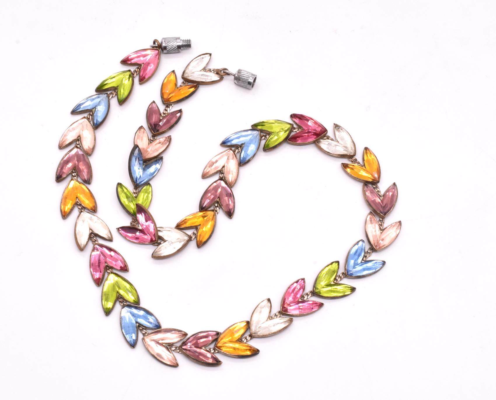 Made from Czechoslovakian glass, our antique harlequin necklace has beautifully carved cool mirror backed stones in a variety of colors. It is very hard to find Czechoslovakian glass necklaces with glass pieces of different alternating colors; they