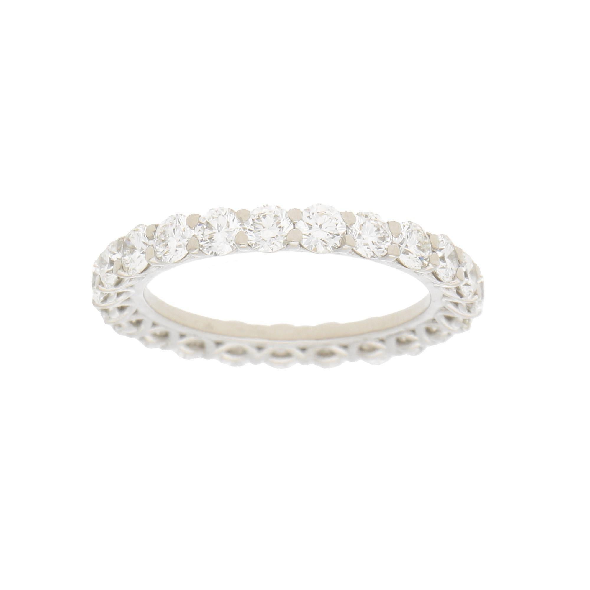 A truly remarkable full diamond eternity ring set in 18k white gold. The eternity ring is set with exactly 23 round brilliant diamonds in four claw settings. What makes this eternity ring so remarkable is the colour of the diamonds. All the diamonds