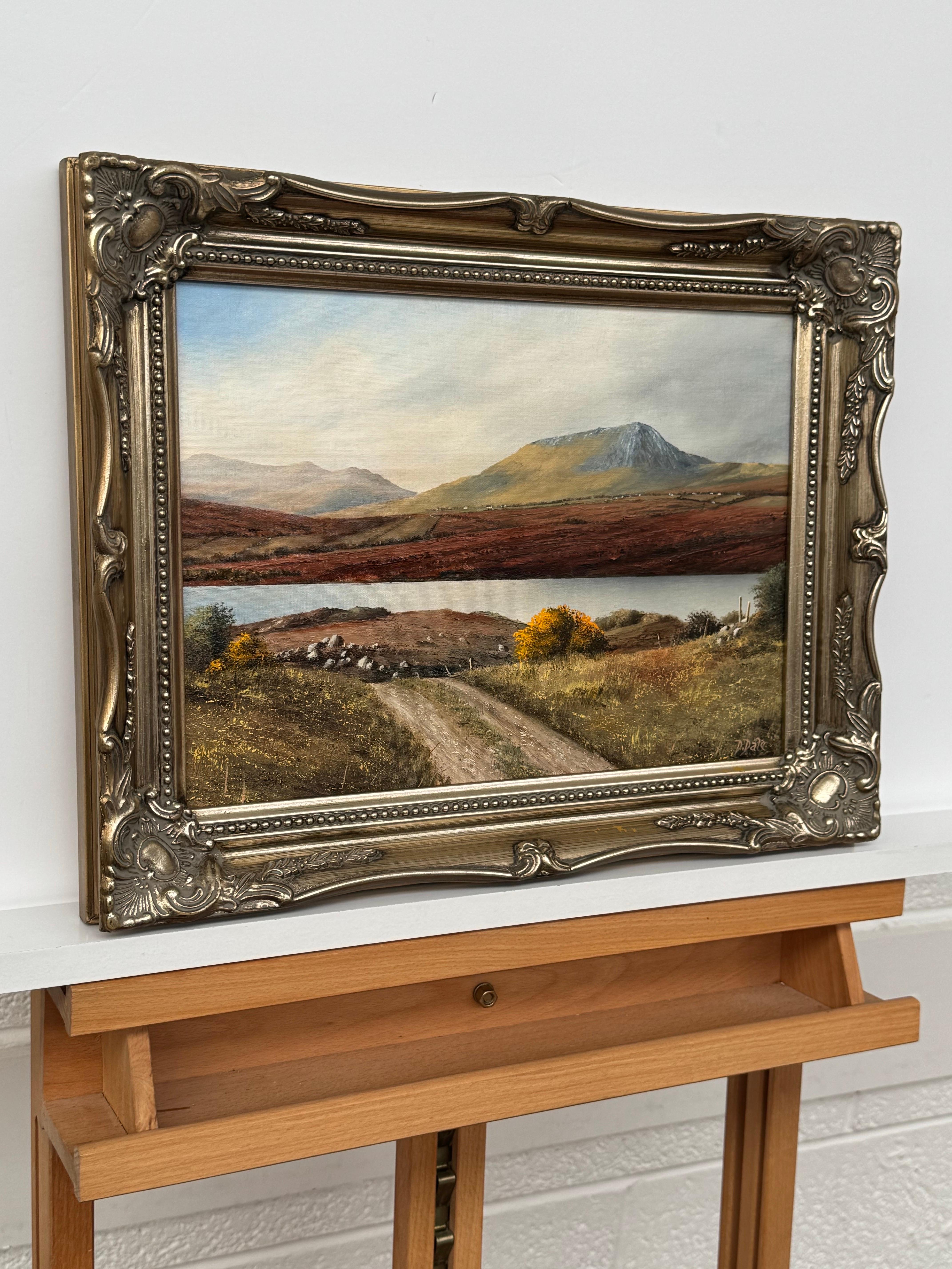 Mountain Lake Landscape of County Donegal Northern Ireland Vintage Irish Art, by Irish Artist, D Dale. 

Art measures 14 x 10 inches 
Frame measures 17 x 13 inches 

Vintage bronze frame 

This beautifully detailed landscape captures the quiet