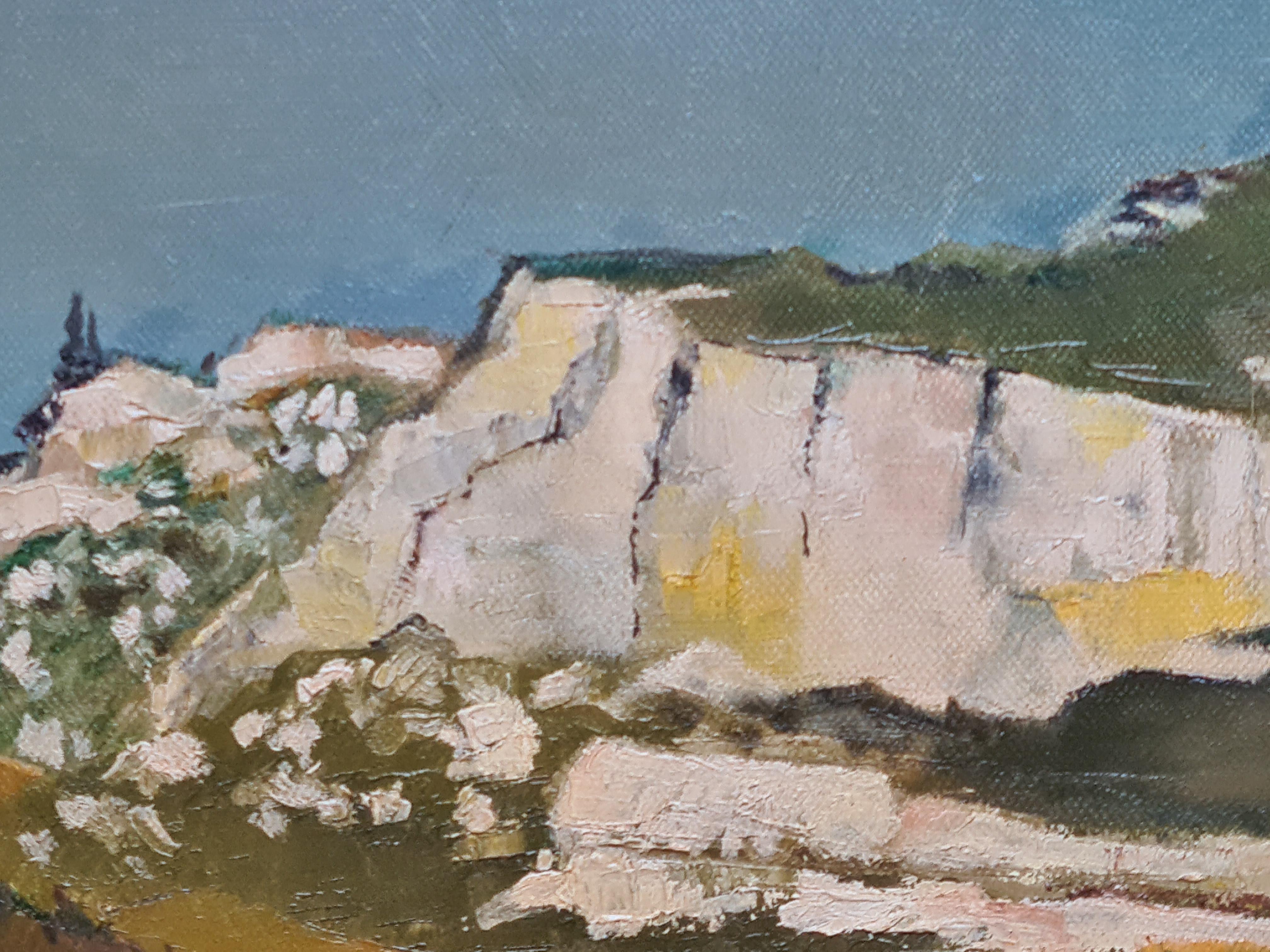 Huile sur toile Colour Field du Mont St Victoire dans le sud de la France par D Haigel. Le tableau est signé et daté en bas à droite et présenté dans un cadre vert et doré.

Cette charmante peinture représente un paysage vivant dominé par