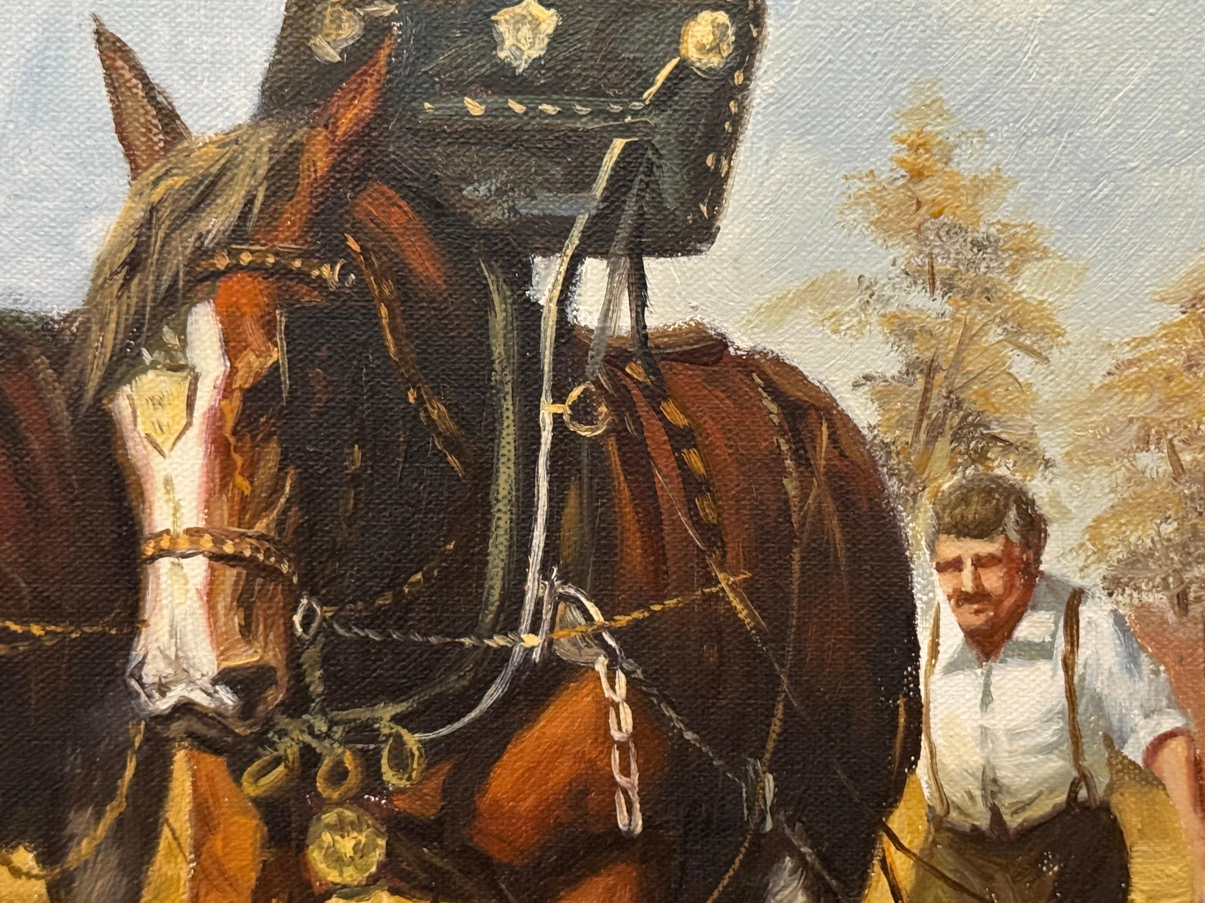 Chevaux Clydesdale et fermier labourant un champ d'automne doré dans une campagne rurale en vente 9