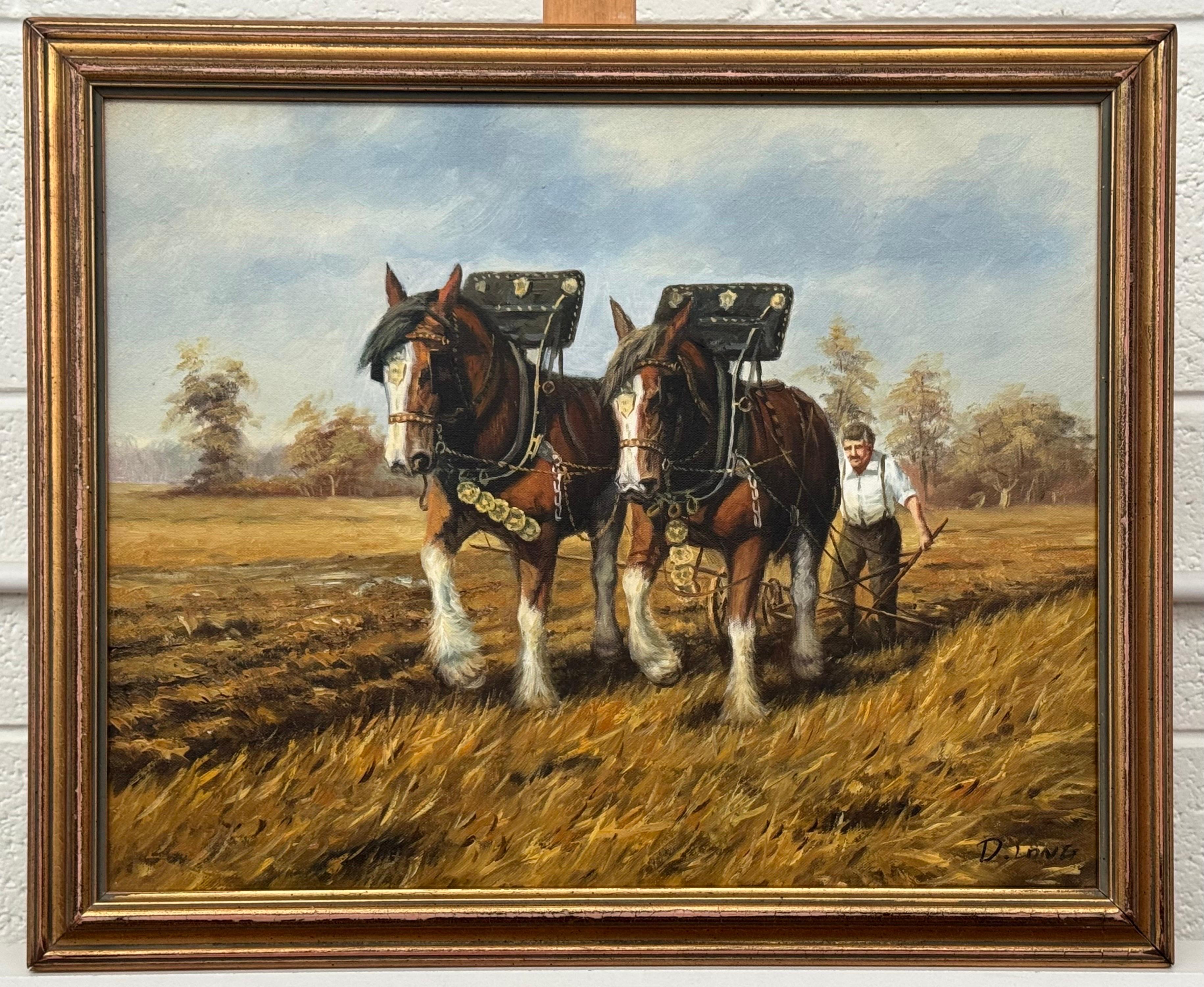 Chevaux Clydesdale et fermier labourant un champ d'automne doré dans une campagne rurale en vente 4