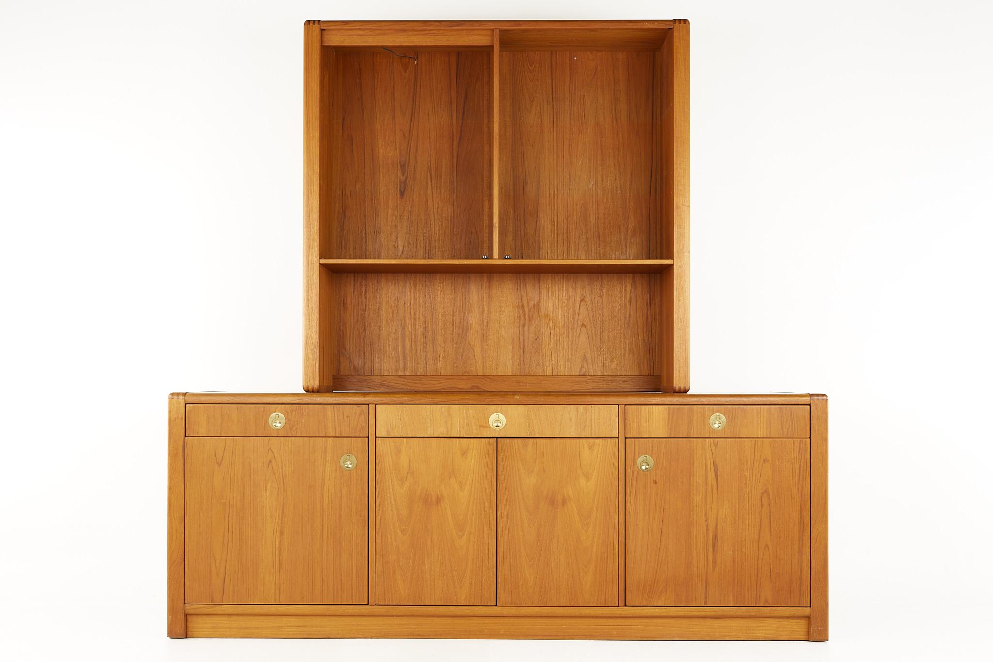 D Scan mid century teak and brass buffet and hutch

This buffet measures: 79 wide x 19.5 deep x 29.5 inches high

(Measurements for hutch are pending)

All pieces of furniture can be had in what we call restored vintage condition. That means