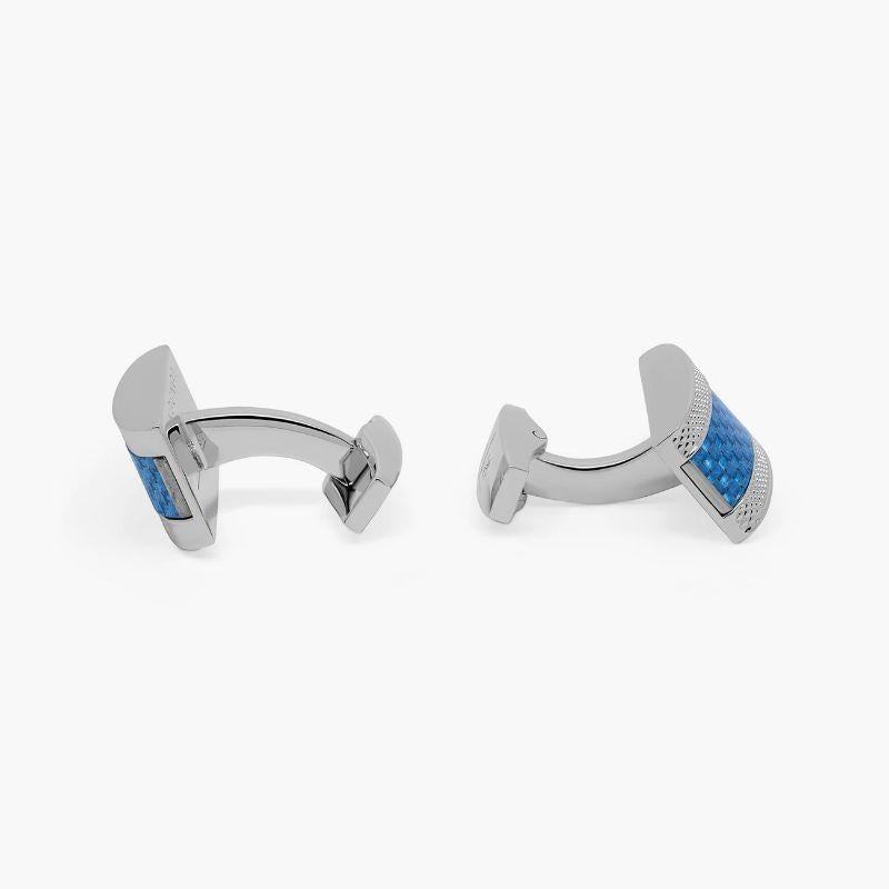 D Shape cufflinks with blue alutex in stainless steel

Our timeless D-shaped frame features an inlaid panel of blue Alutex, with our signature diamond pattern engraved around the face of each cufflink. Designed to be fun, fashionable and functional,