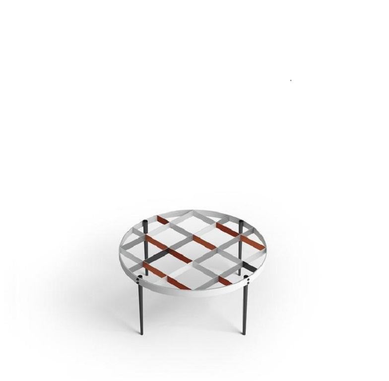 A design represented straight from Gio Ponti’s house, located in via Dezza in Milan.

100% Made in Italy
Based on the original drawings from the Ponti Archives
Metal hand painted structure and glass top.