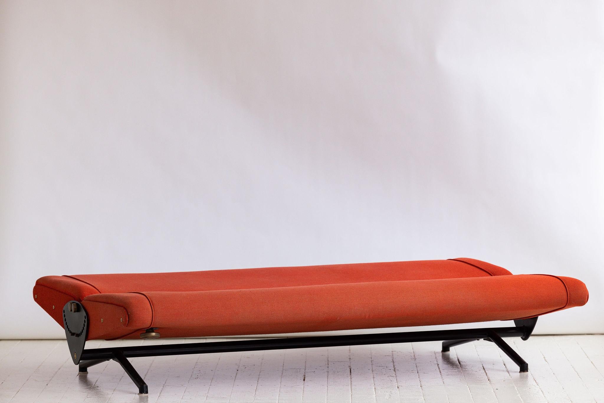 Extrordinary elegence in form,  outstanding in a technical sense. A sofa that transforms to a daybed. Designed by Osvaldo Borsani in 1954. With a single twist, the back and seating are positioned upwards (or down) making it practical for any