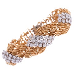 d7.85cttw G/VS 18k YG/plat articulating 1960's brac.