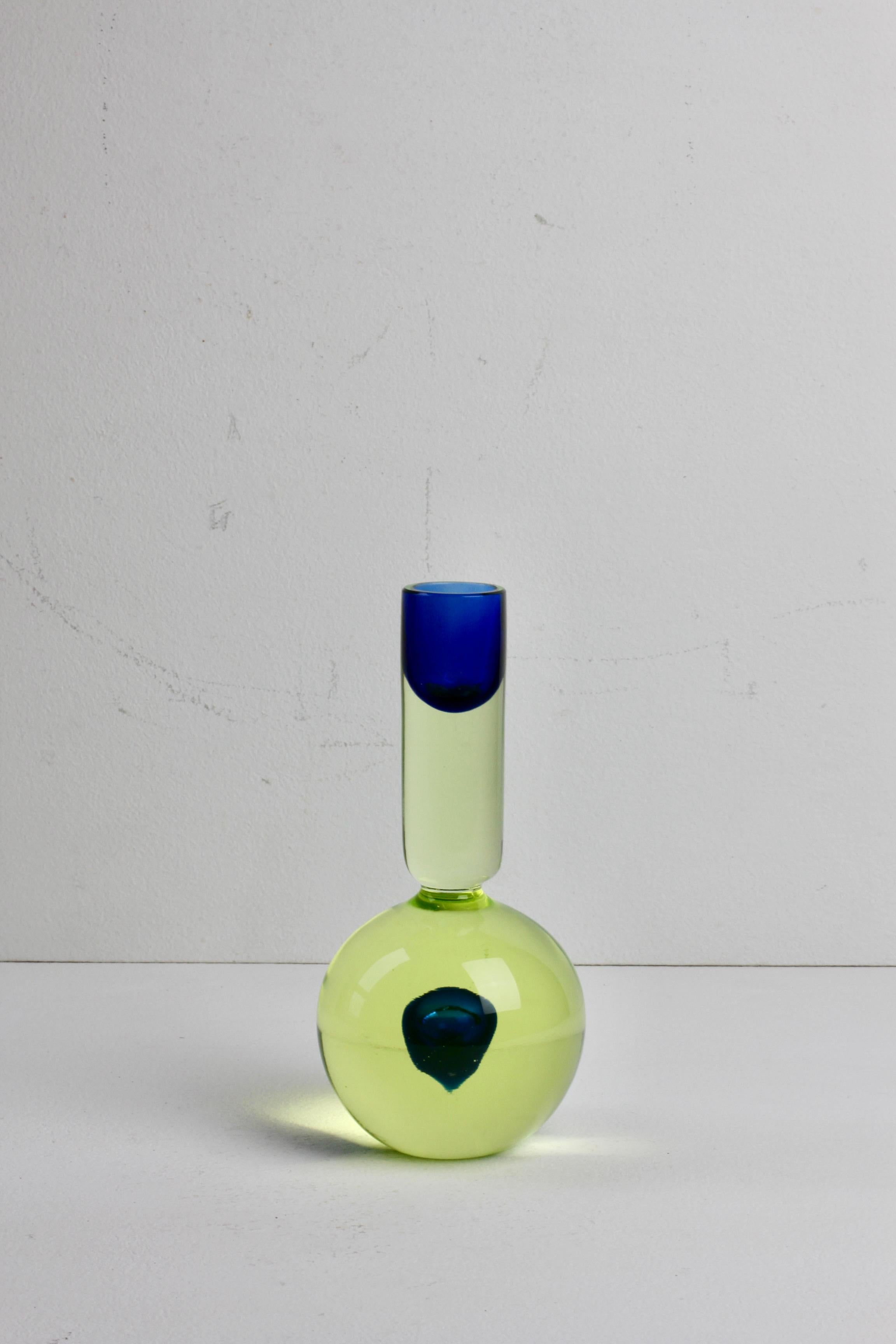 Rare Antonio da Ros for Cenedese vintage Italian yellow uranium Murano glass candlestick stand, holder or Candelabra made circa 1960s with a blue central sphere and blue sommerso top for holding the candlestick. Utilizing the Murano glass technique