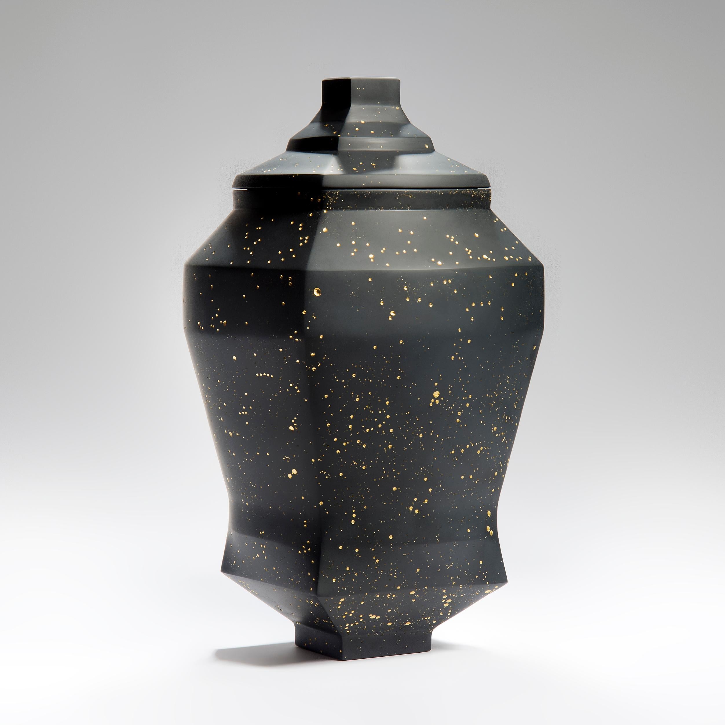 Daam Dah 9 is a unique black cast glass lidded box with 23.5-carat gold leaf, created by the South Korean artist, Choi Keeryong. When casting glass, tiny bubbles become trapped within the glass. With this piece, the artist has treated all the