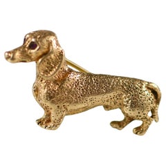 Dachshund 14K Yellow Gold Ruby Eye Dog Brooch by William Ruser