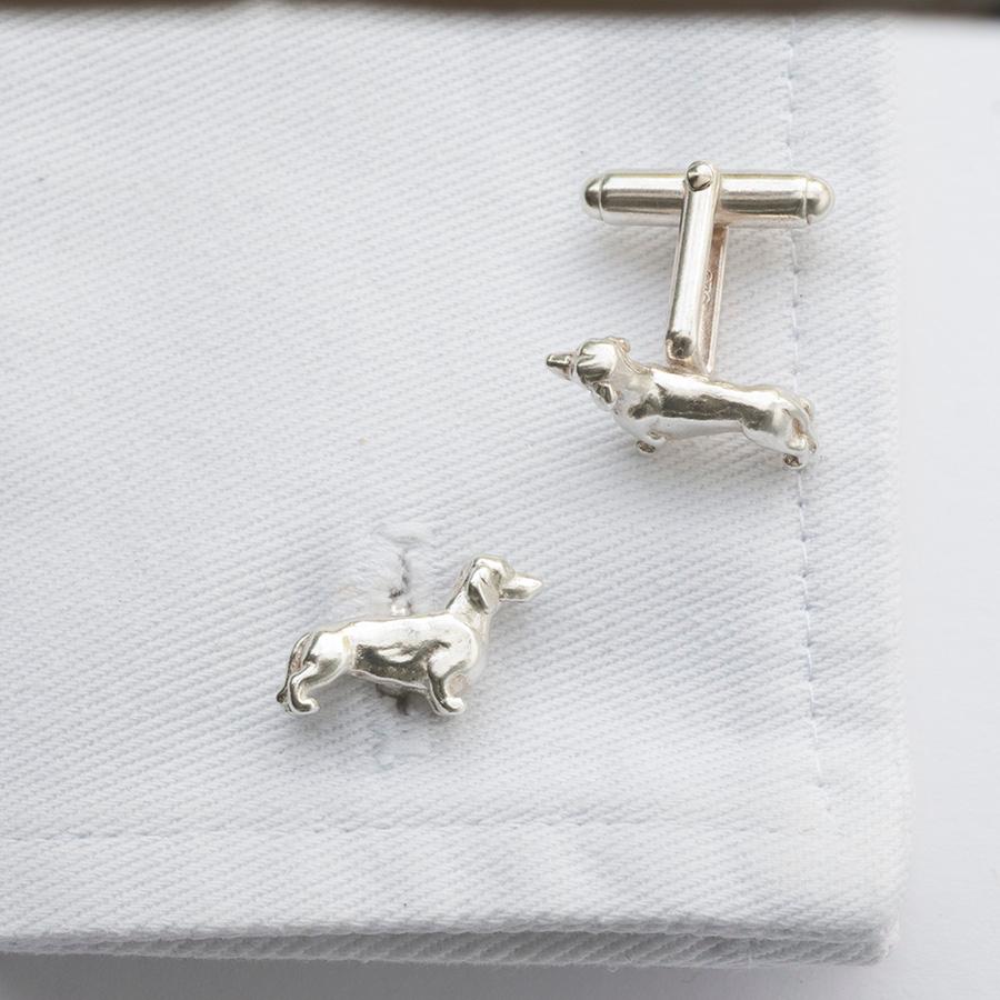 We have caught the character of these charming dogs and turned them into a great pair if cufflinks.
Cast in solid sterling silver the dachshunds face each other on the cuffs, sitting proud.