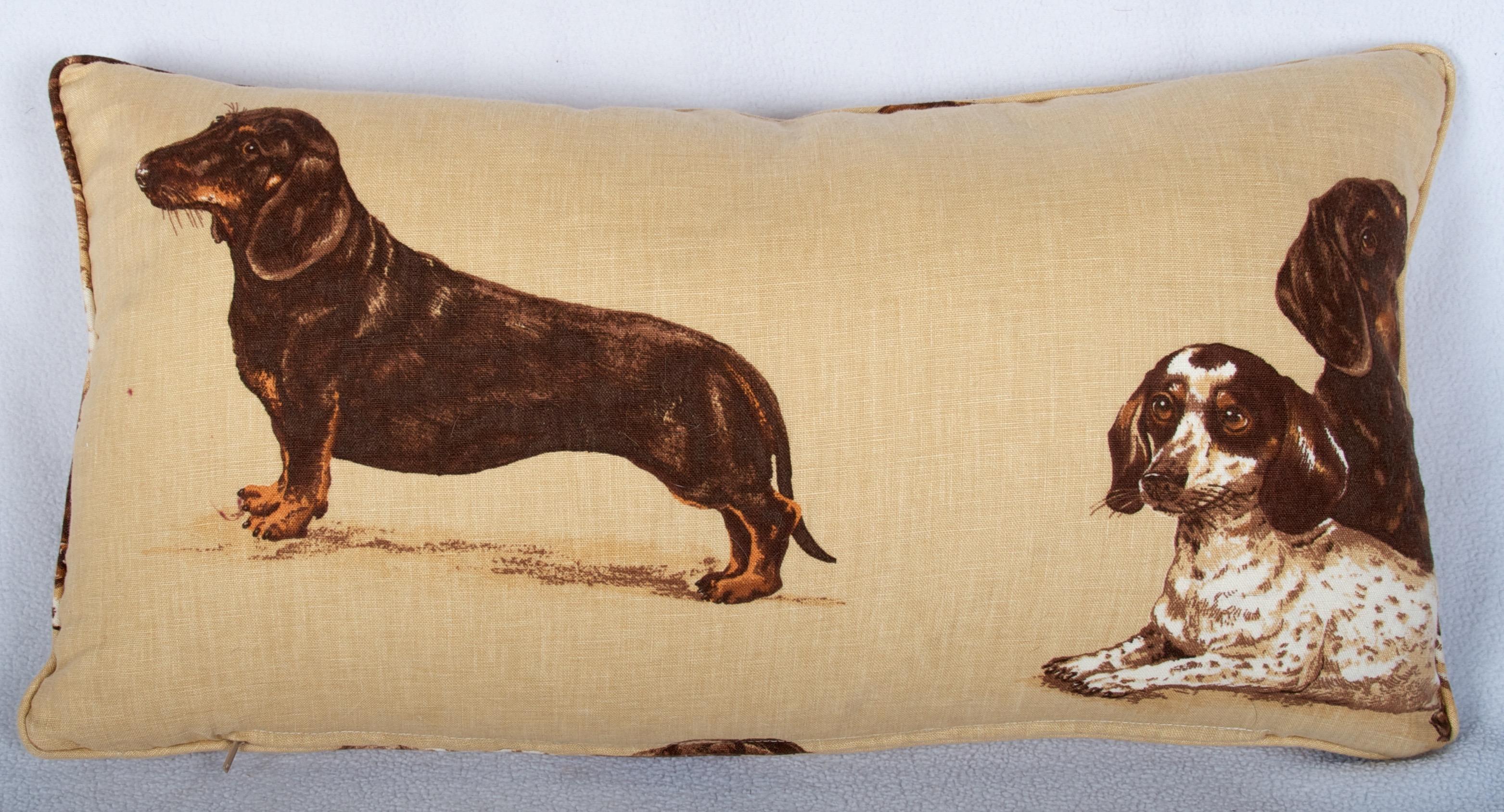 A wonderful pillow fabricated with images of printed linen
depicting beautiful Dachshund hounds. 
Several more can be ordered, with different images.
The third image shows the reverse side, showing the hounds in
a different configuration.