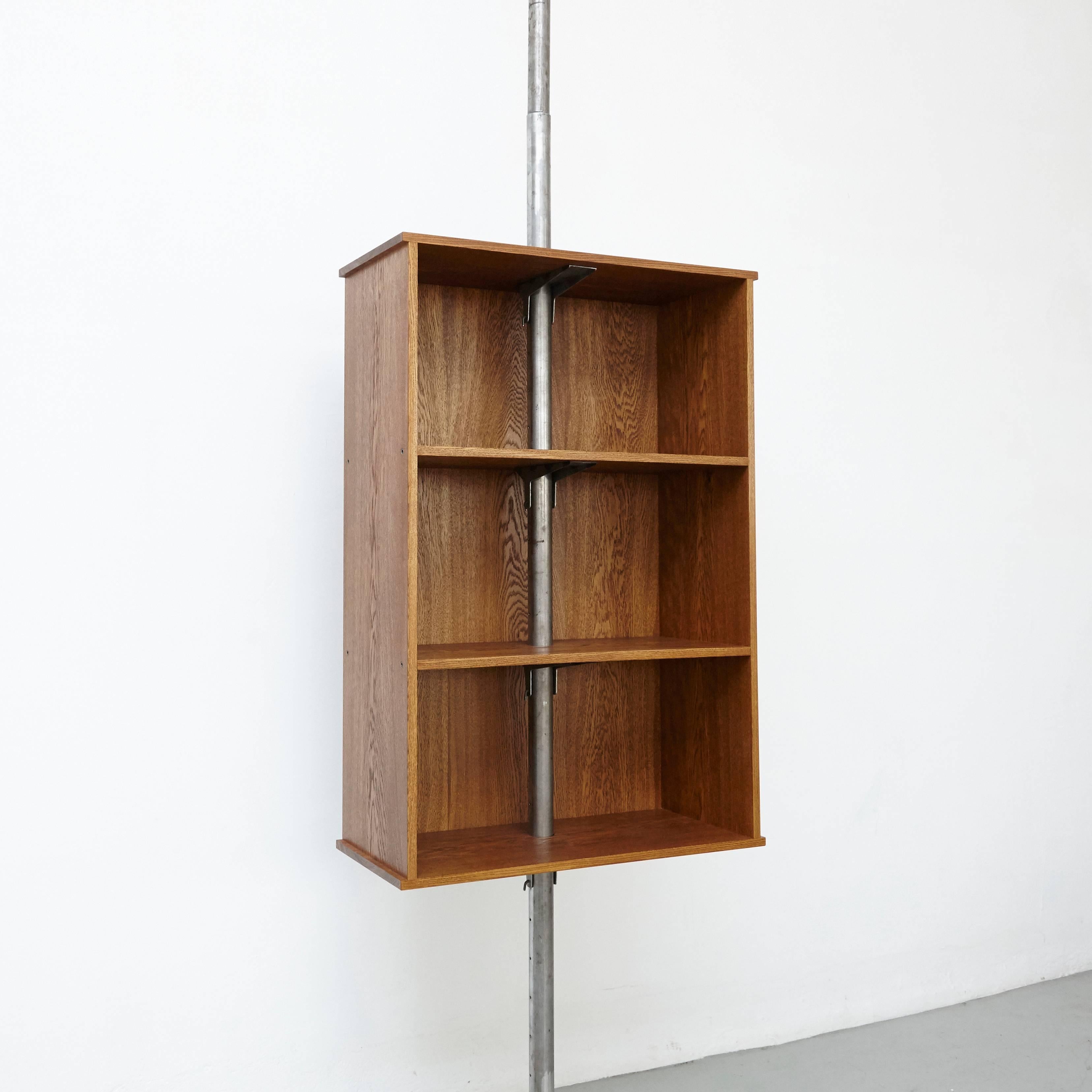 Bibliotheque designed by DADA est. manufactured in Barcelona, 2017.

Adjustable bibliotheque suspended,

Iron and oak

Measures: 40 x 91 x 420 cm.
 