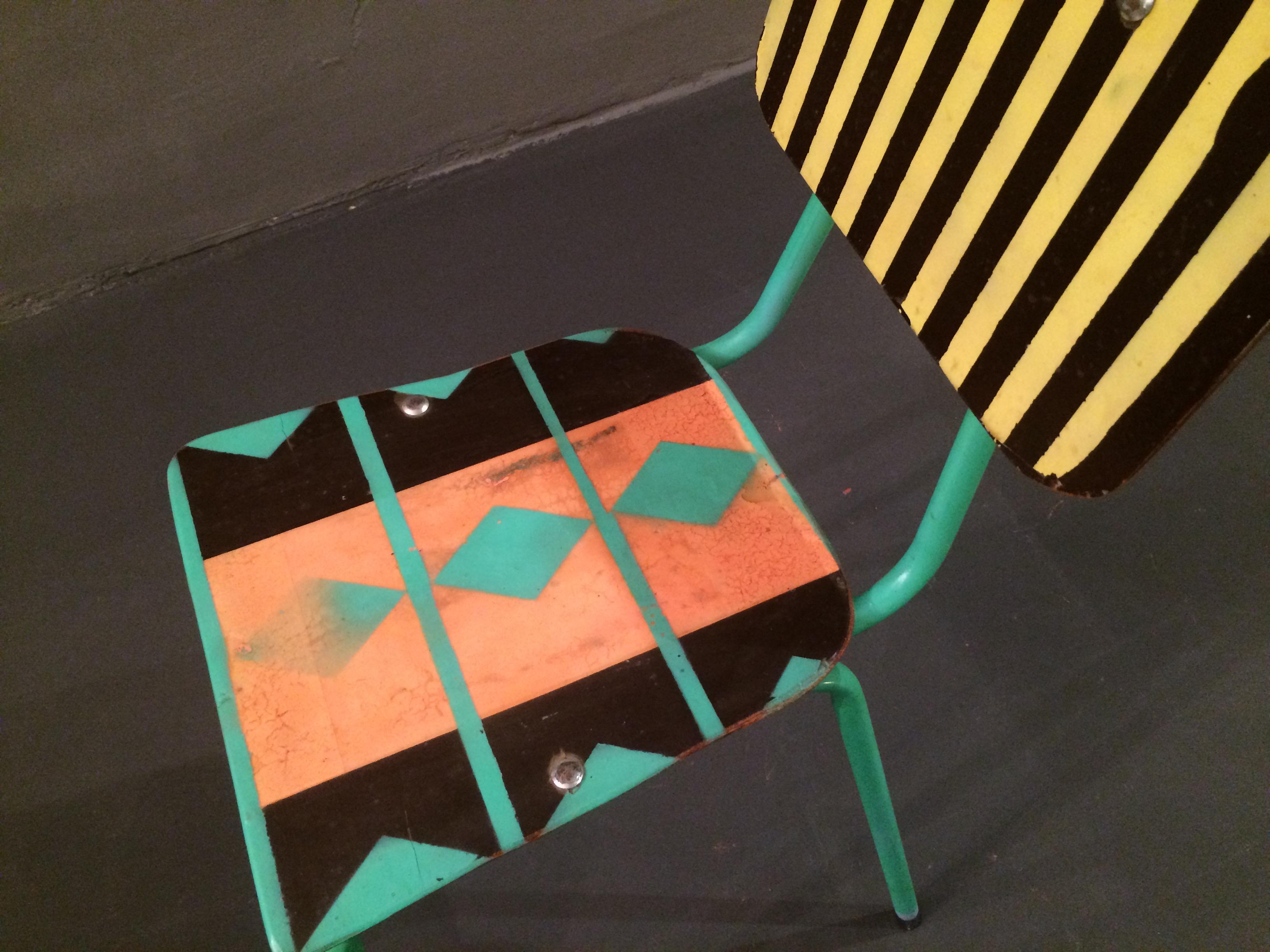 Staabs Dada chair is a slim, light and comfortable little piece of functional art and conversation piece. 1950s steeltube frame with assembled plywood seat and backrest. Spraypainted patterns in yellow, orange and green give the chair a Victor