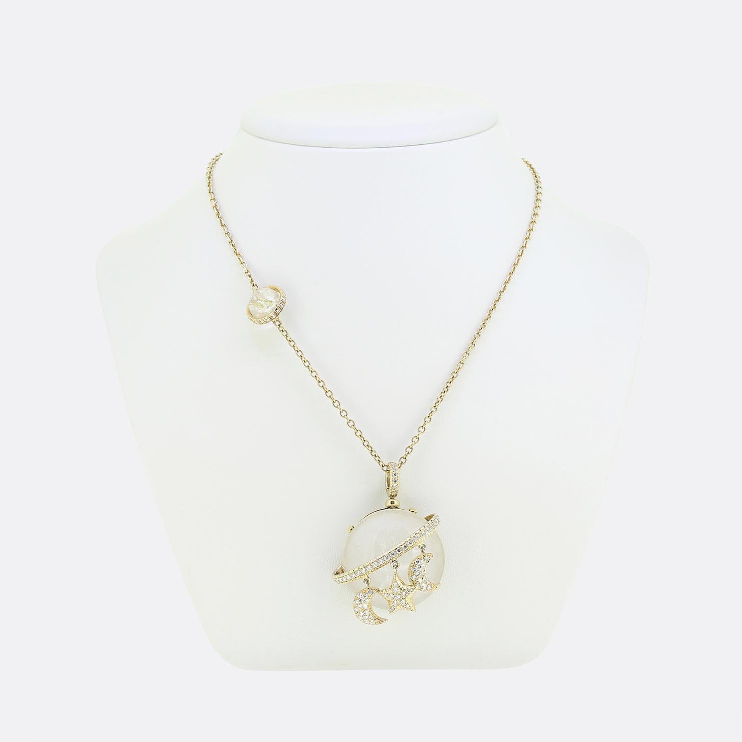 Here we have a captivating necklace focally featuring a spherical moonstone. This principal stone acts as the backdrop to the pendant whilst being encircled by a delicate band of bright white round brilliant-cut diamonds, creating a celestial motif.