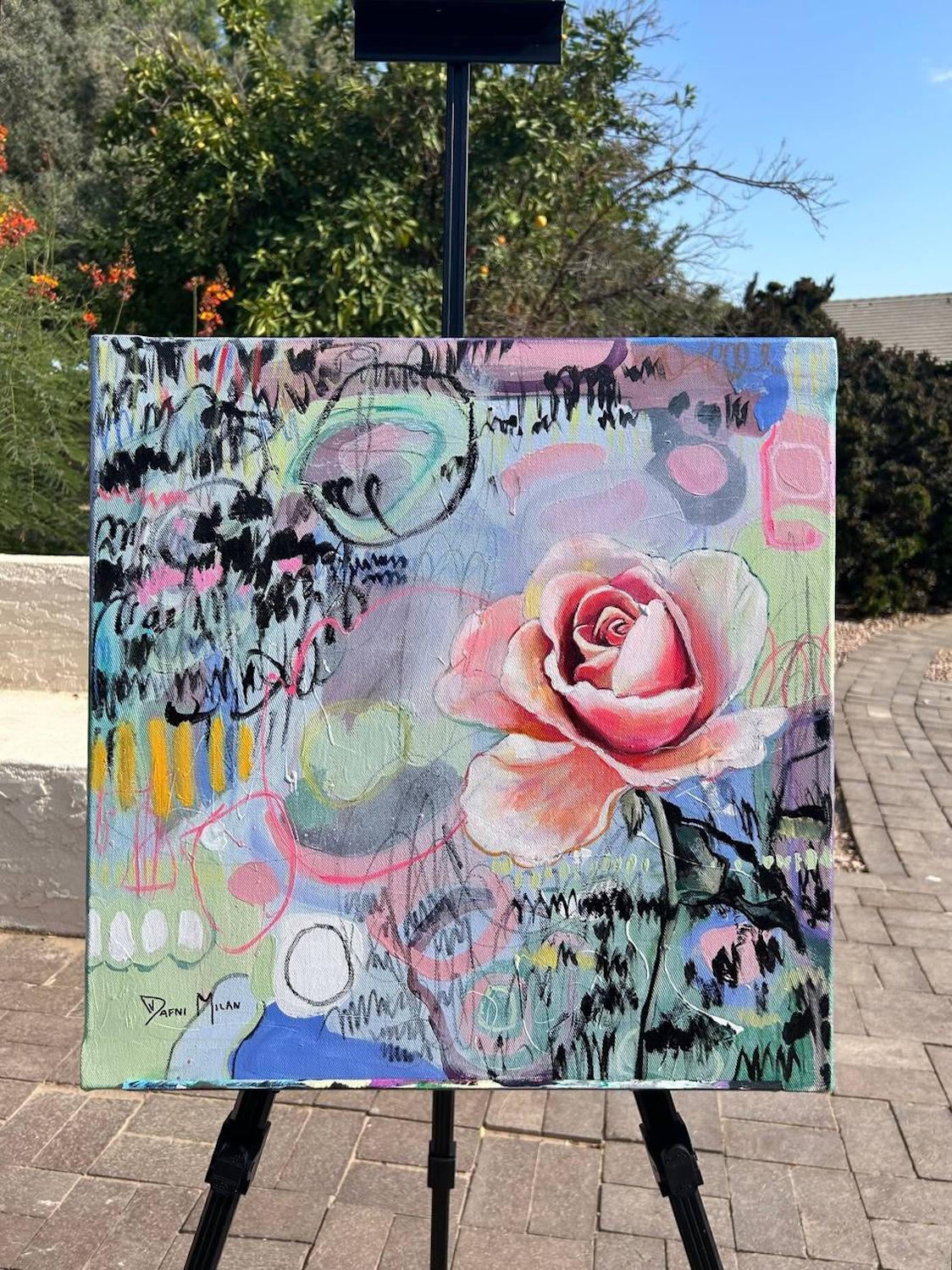 <p>Commenti dell'artista<br />Una rosa sboccia su uno sfondo pieno di segni di inchiostro nero e colori pastello. Mostra come la bellezza possa prosperare anche nei momenti più bui. L'artista Dafni Milan ha utilizzato una combinazione di colori