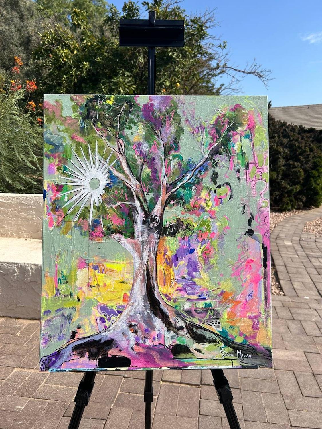 <p>Comentarios del artista<br />Hojas de colores rodean un árbol con rayos blancos asomando por detrás. El detallado tronco contrasta con las hojas y los vibrantes trazos del fondo. La obra de arte evoca el calor del sol, inspirando un abrumador
