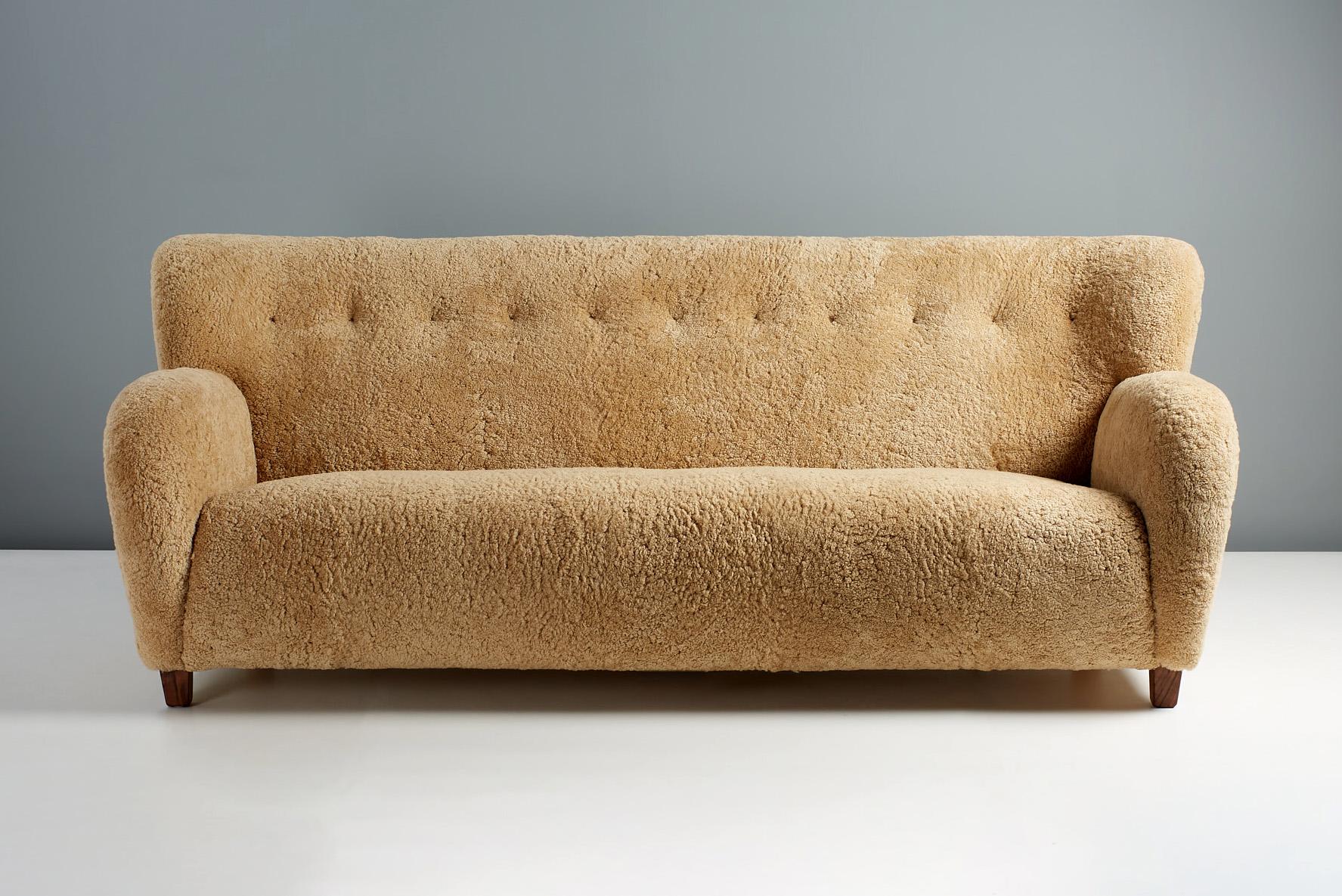 Dagmar Karu sofa

The Karu sofa has been developed and handmade at our workshops in London. The sofa legs are available in oiled oak, dark fumed oak, oiled walnut (as shown) or dark stained beech. The frame is made entirely of solid English beech
