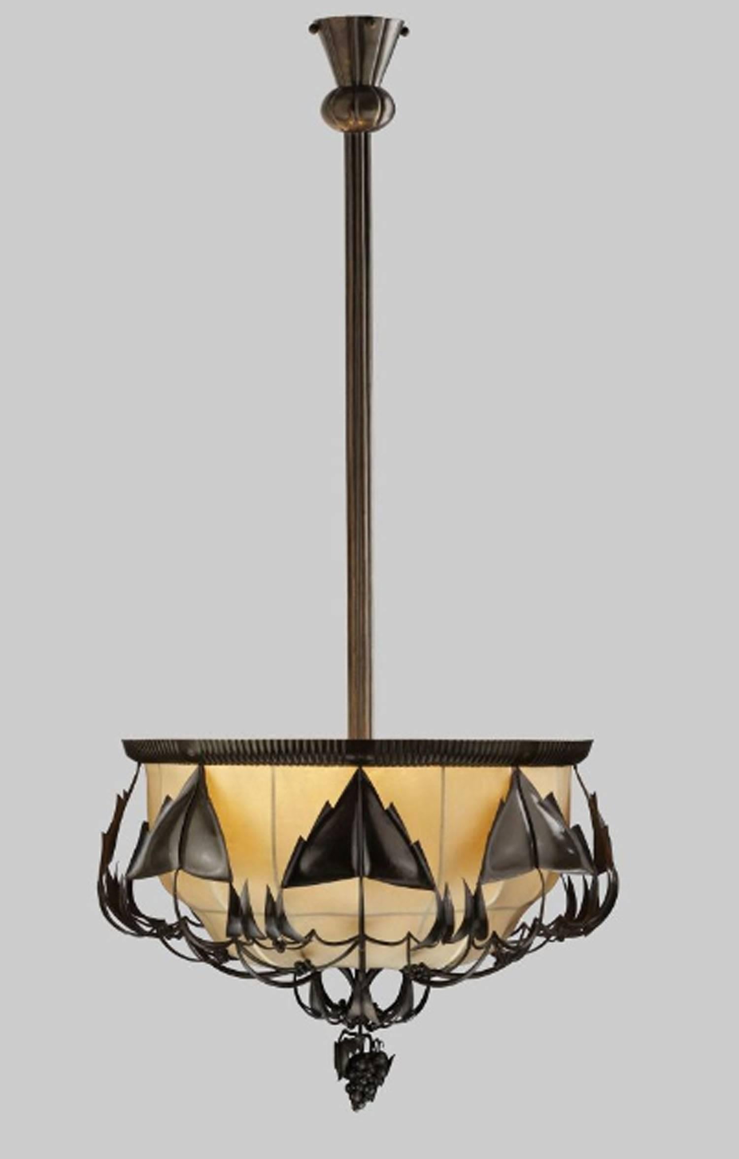 Unusual chandelier made in solid brass, hand-hammered ornaments, can be made in any surface, on the image in a dark patina. The total drop with the length of the stem can be adjusted individually
Most components according to the UL regulations, with