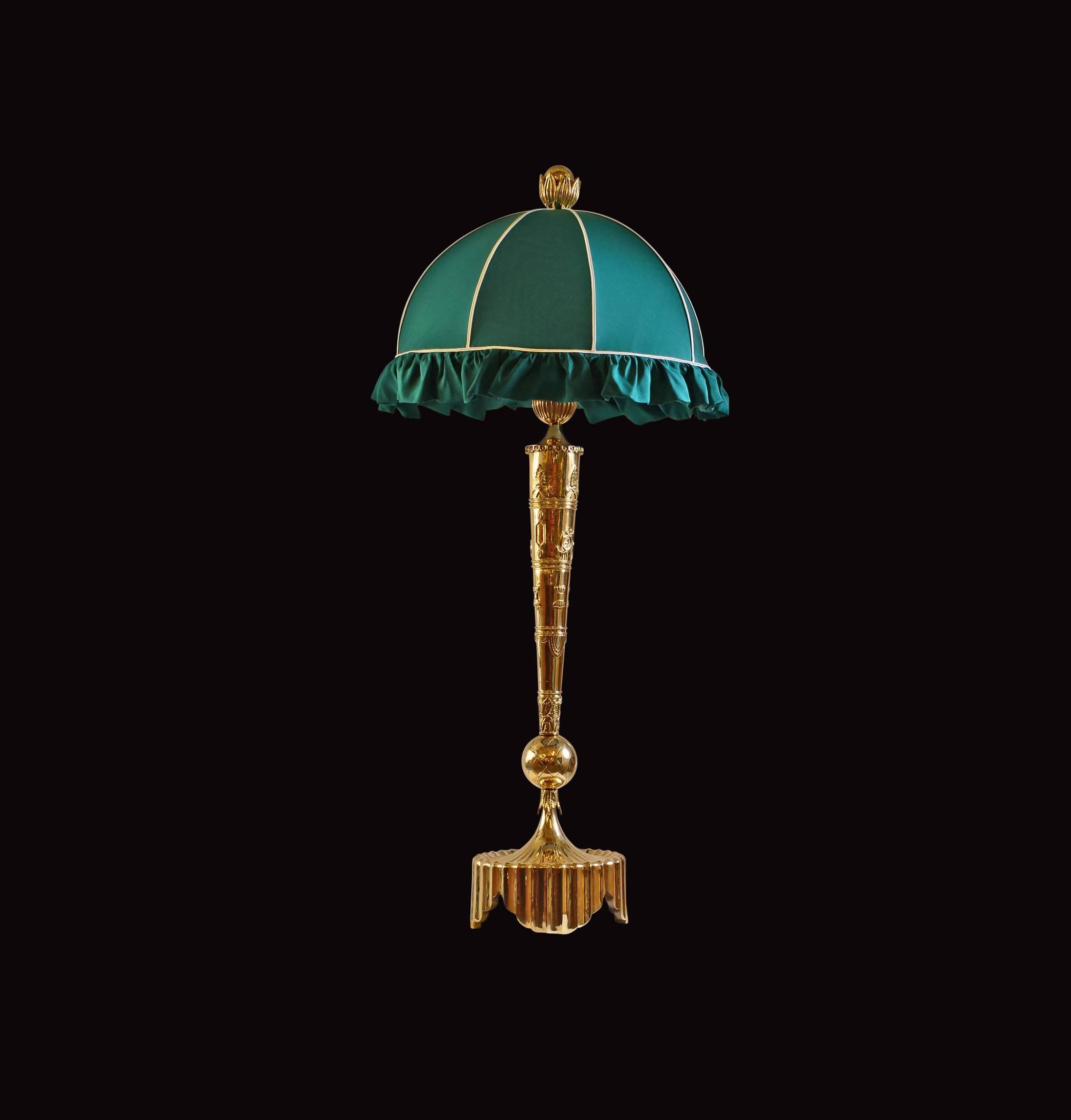 Tremendous and elaborate table lamp with for this outstanding designer typical ornaments

casted and forged brass, hand-sewn silk-shade

Most components according to the UL regulations, with an additional charge we will UL-list and label our