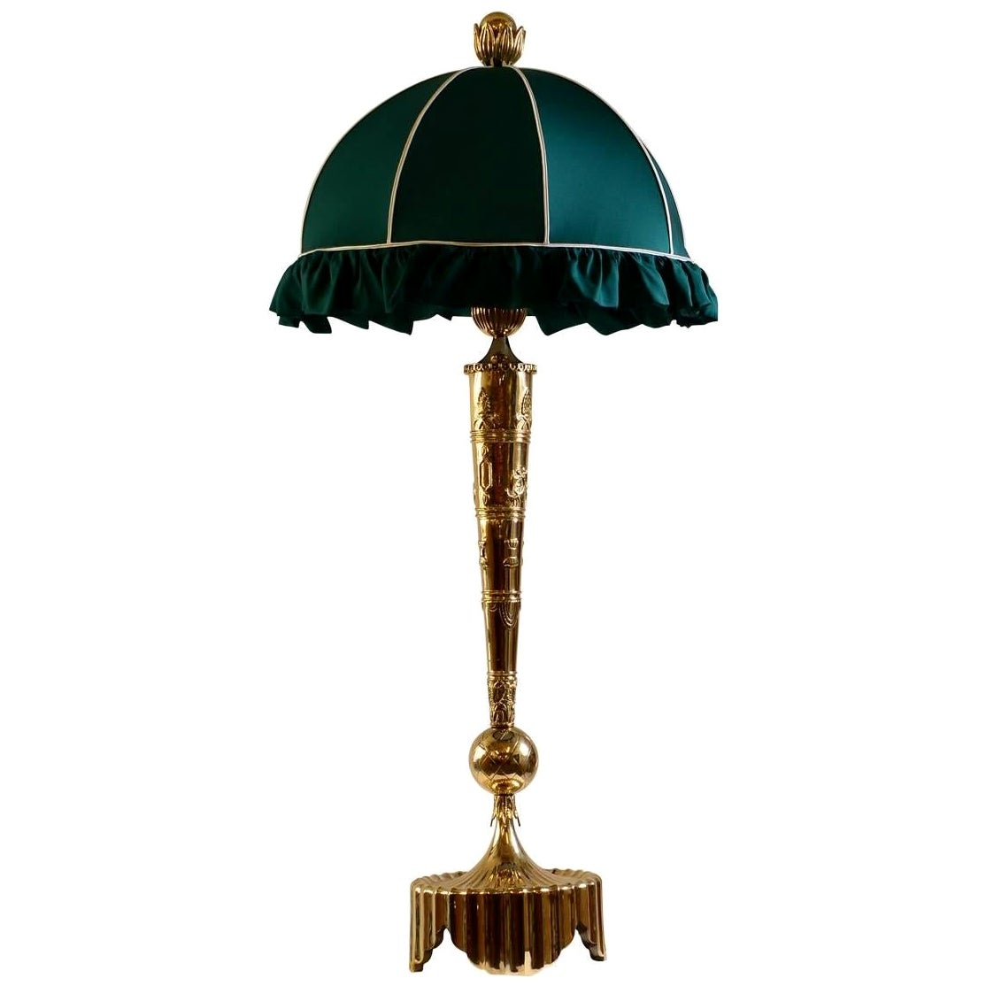 Tremendous and elaborate table lamp with for this outstanding designer typical ornaments

casted and forged brass, hand-sewn silk-shade

Most components according to the UL regulations, with an additional charge we will UL-list and label our