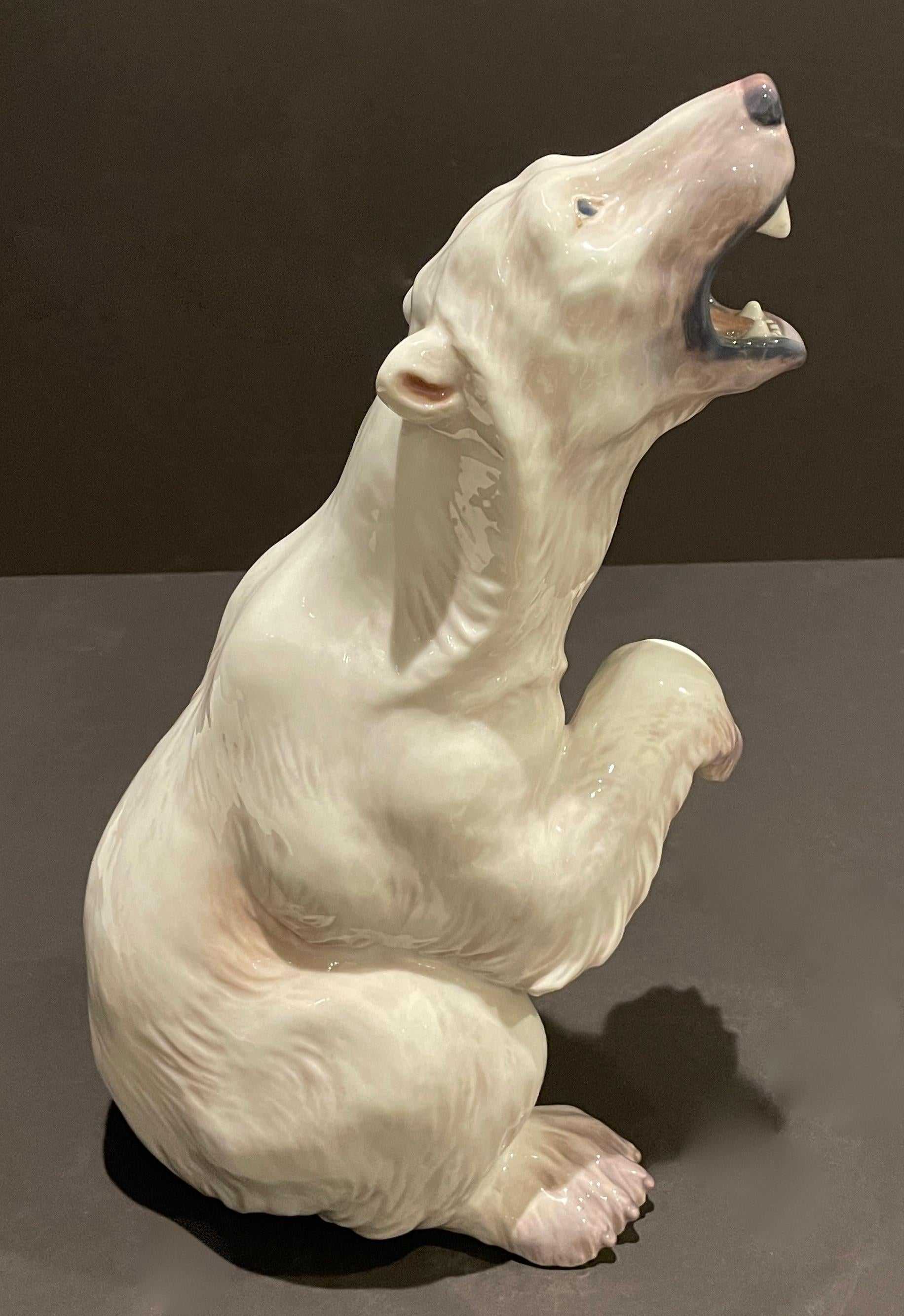 Dahl Jensen Figure Of A Polar Bear. Fine quality porcelain figure of a upright seated polar bear. Marked and numbered #1157. 
Dahl Jensen
Dahl Jensen Porcelain is a renowned Danish manufacturer of fine porcelain and ceramics that specializes in