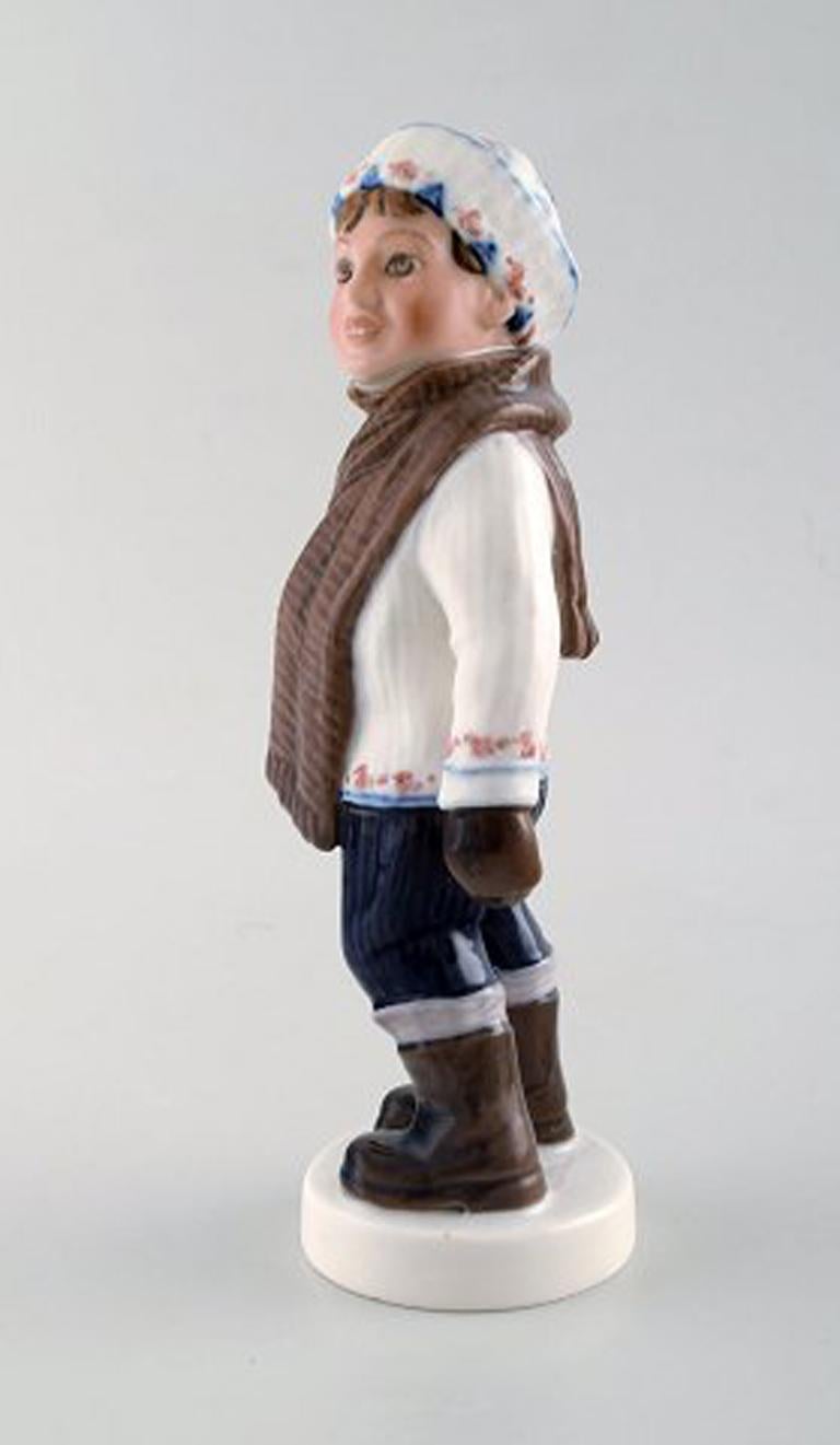 Dahl Jensen Porcelain Figurine, Boy in Winter Clothes, Model Number 1064 In Good Condition In Copenhagen, DK