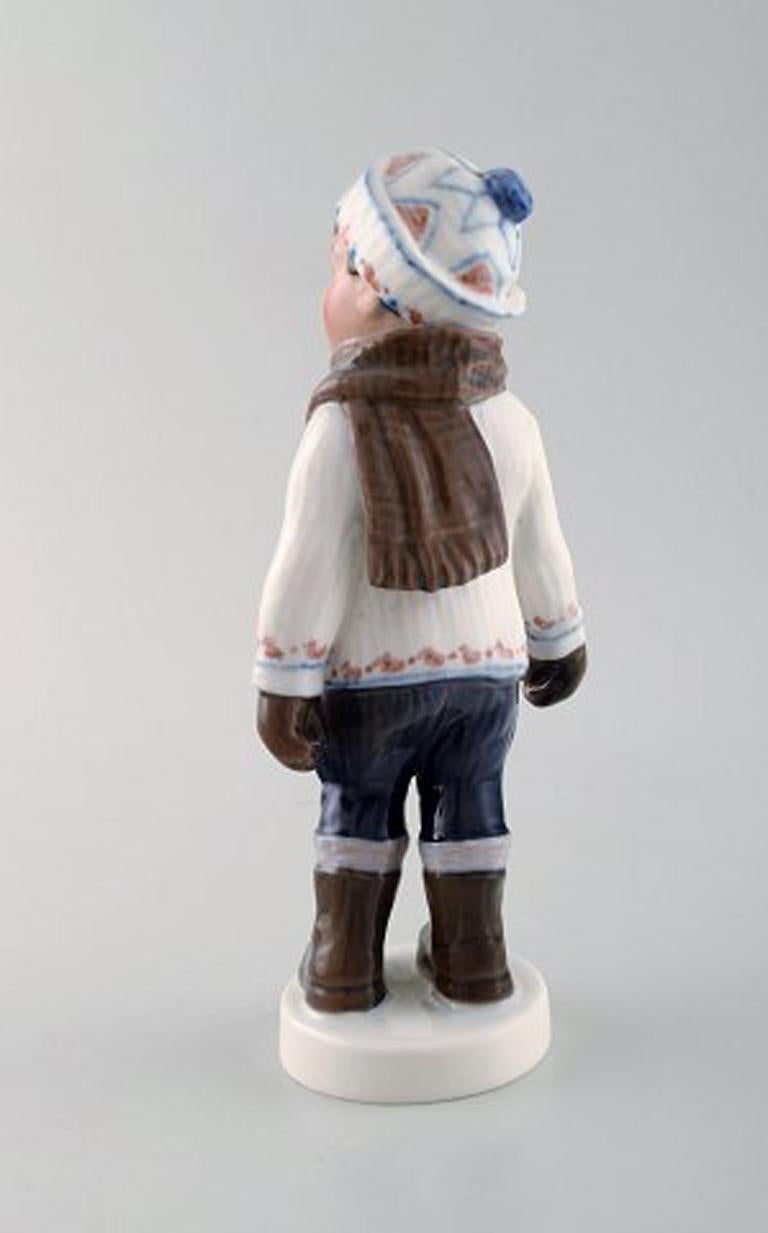 Early 20th Century Dahl Jensen Porcelain Figurine, Boy in Winter Clothes, Model Number 1064
