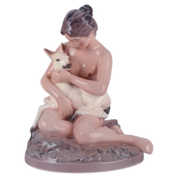 Figurine en porcelaine de Dahl Jensen, fille avec faon.