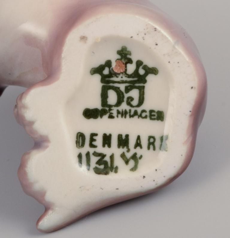 Dahl Jensen, porcelain figurine of a Dachshund. 1930s 1