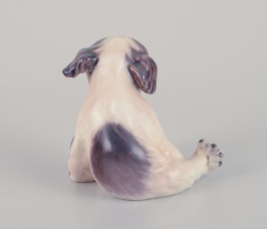 Mid-20th Century Dahl Jensen porcelain figurine of a Pekingese puppy.  For Sale
