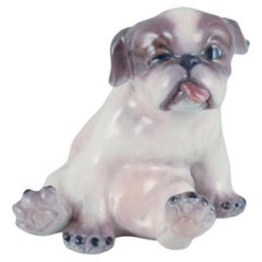 Dahl Jensen, porcelain figurine of a Pekingese puppy.