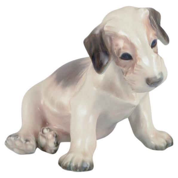 Figurine en porcelaine de Dahl Jensen représentant un chiot de Terrier de Sealyham.