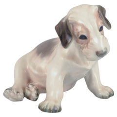 Figurine en porcelaine de Dahl Jensen représentant un chiot de Terrier de Sealyham.