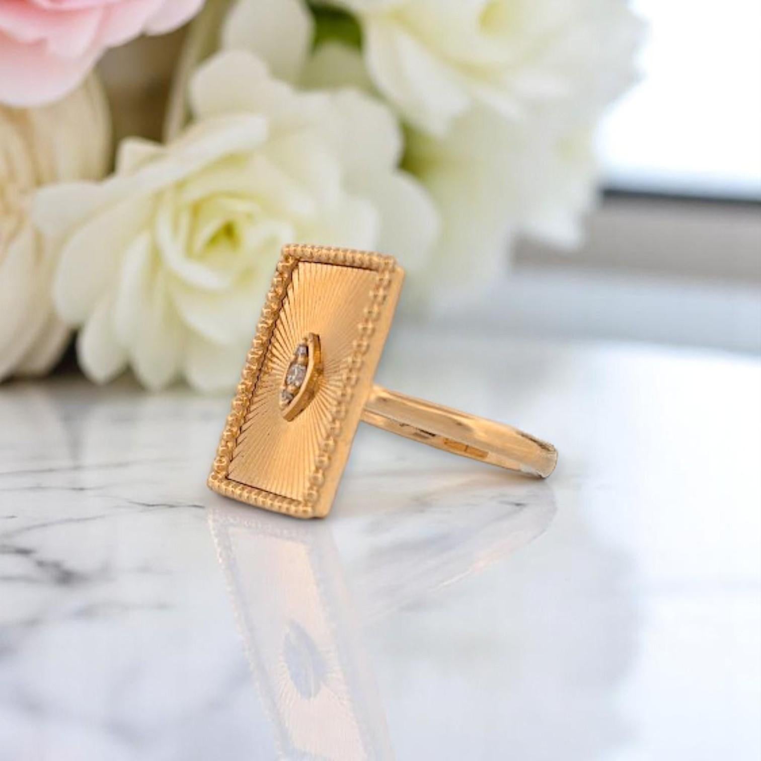 Shine like the radiant goddess you are 🌞 with the Dahlia Helios Ring — a sun-kissed masterpiece designed for the modern romantic who craves subtle luxury and timeless symbolism. Crafted in solid 18k yellow gold, this ethereal band features 0.05