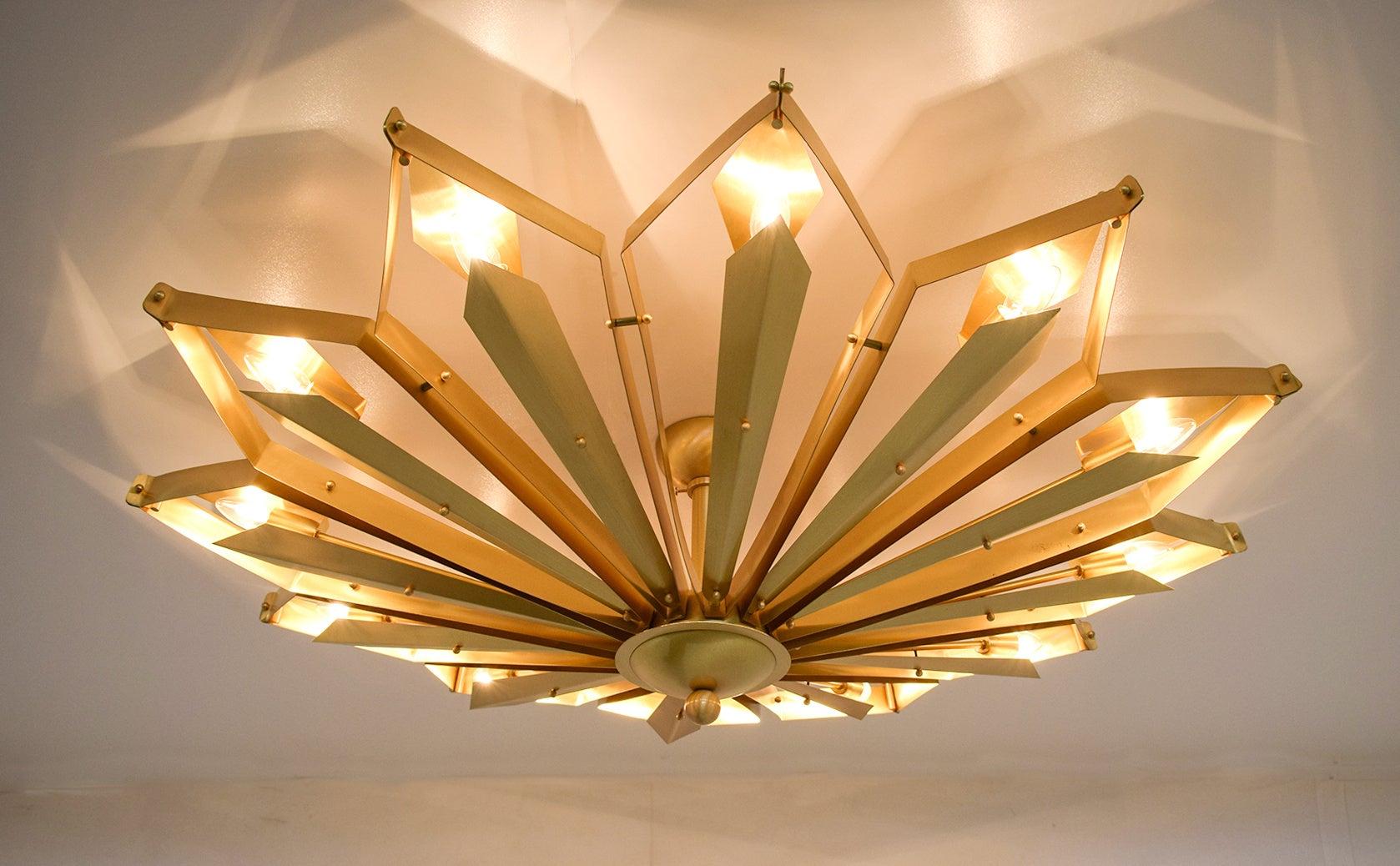 Elegant Italian flushmount with satin brass frame handcrafted to resemble a convex dahlia flower, designed by Fabio Bergomi for Fabio Ltd / Made in Italy
12 lights / E12 or E14 type / max 40W each
Measures: Diameter 51 inches, height 16 inches
Order