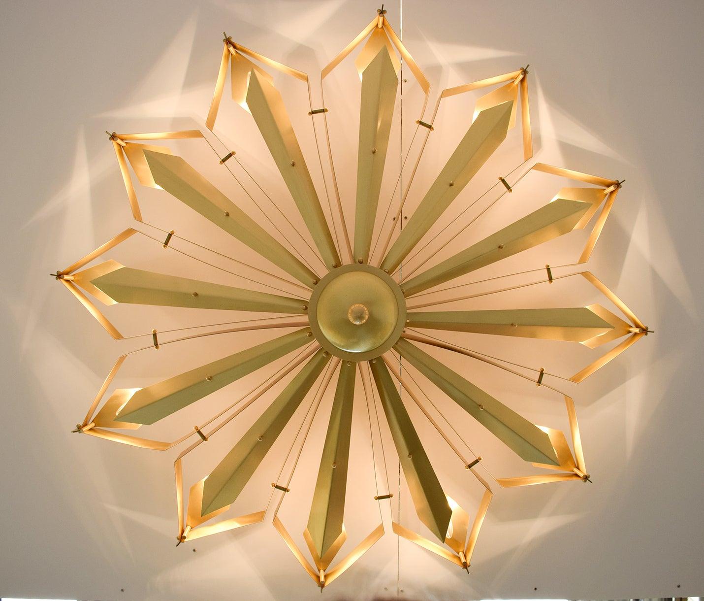 Elegant Italian flushmount with satin brass frame handcrafted to resemble a convex dahlia flower, designed by Fabio Bergomi for Fabio Ltd / Made in Italy
12 lights / E12 or E14 type / max 40W each
Measures: Diameter 51 inches / Height 16