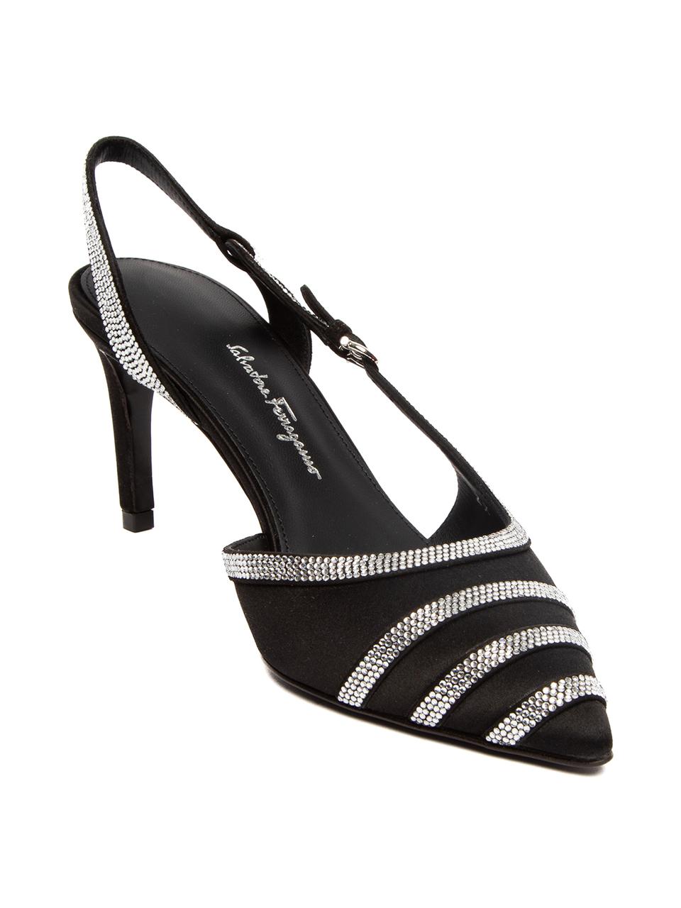 CONDITION is Never worn, with tag. No wear to heels is evident on this brand new Salvatore Ferragamo designer resale item. Slight scratch marks on bottom of the right shoe.
 
 Details
  Dahlia collectiom 
 Nero 
 Fabric with 
 Patterned embossed