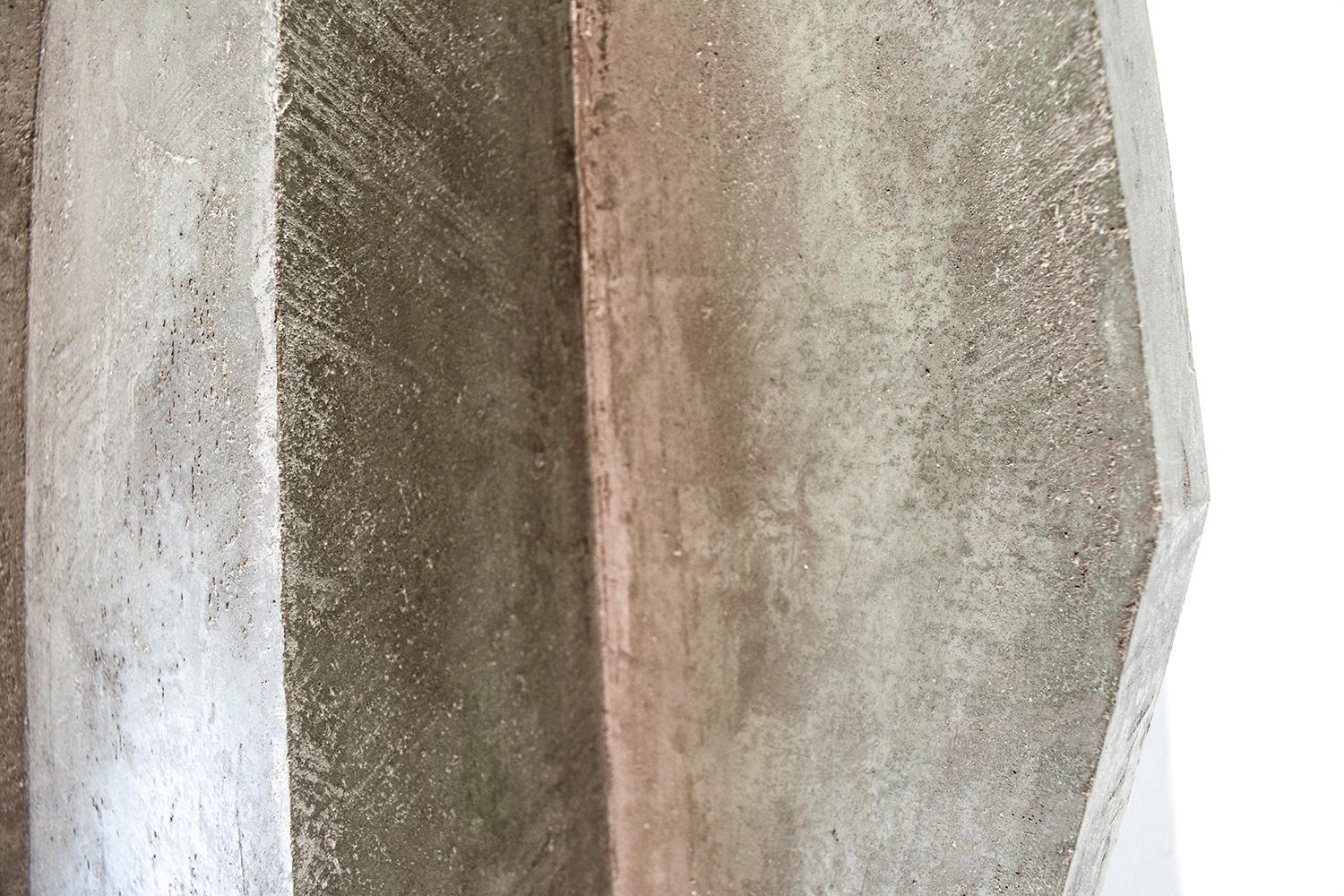 Minimalist three dimensional wall sculpture in slate grey 
