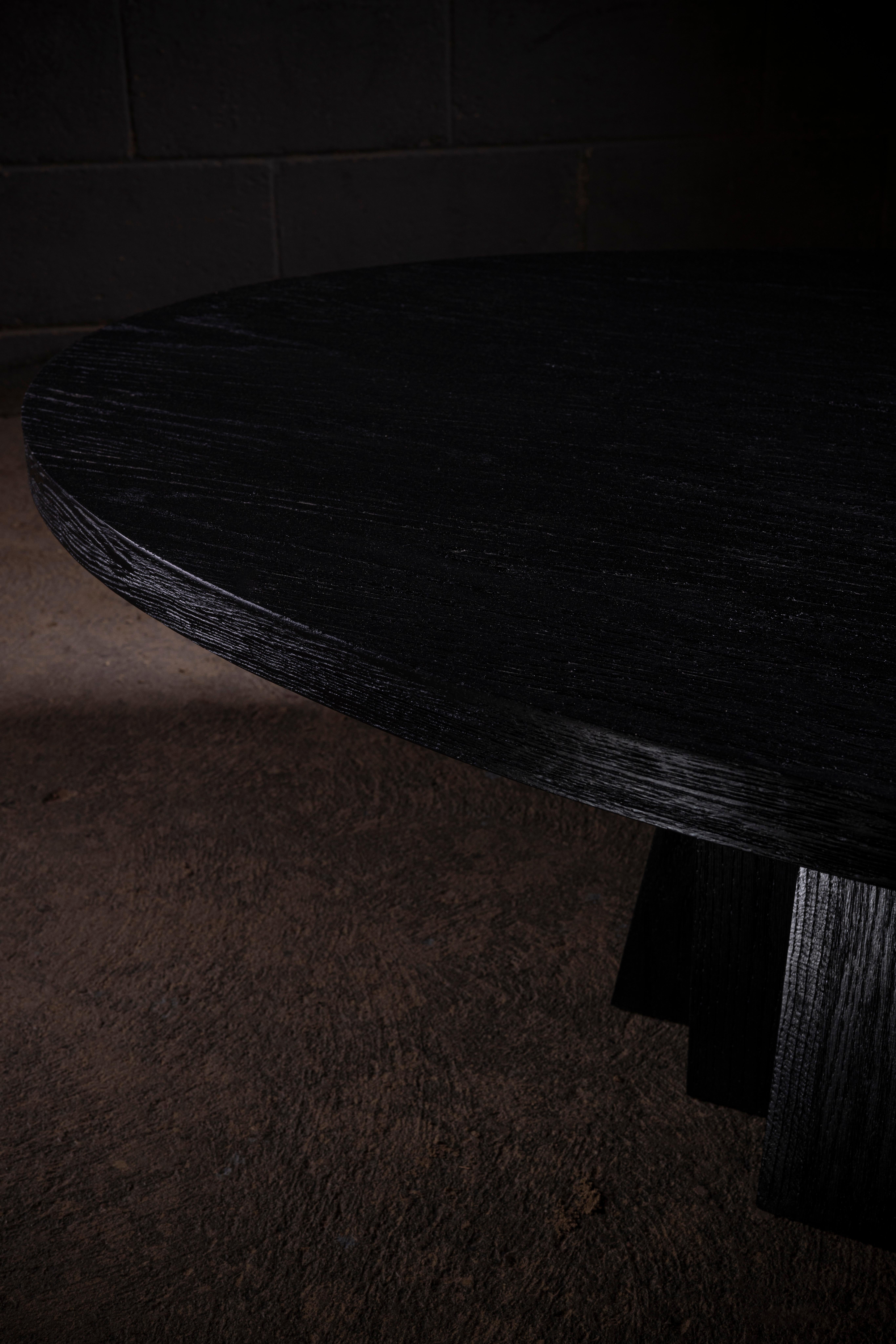 American Daido Oval Solid Black Oak Coffee Table  For Sale
