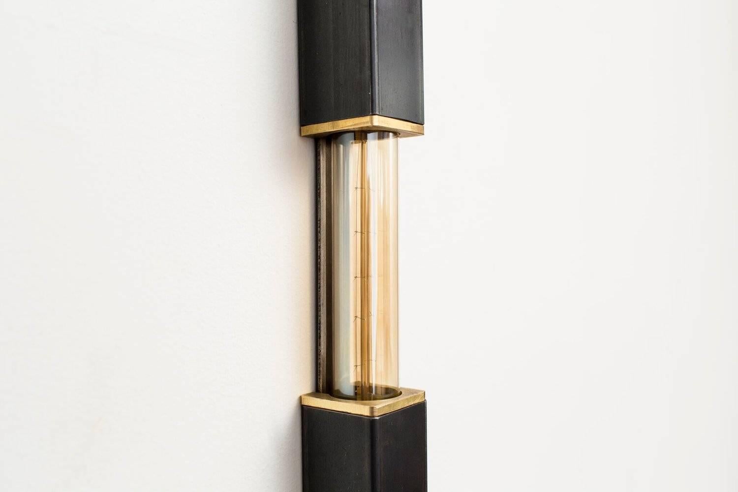 Daikon Studio / Mini Stilk Sconce

Transporting in its simplicity, the Mini Stilk Sconce energizes any room through its powerfully collaborative nature, making it uniquely suited to myriad styles of architecture. Meticulously crafted by hand in our