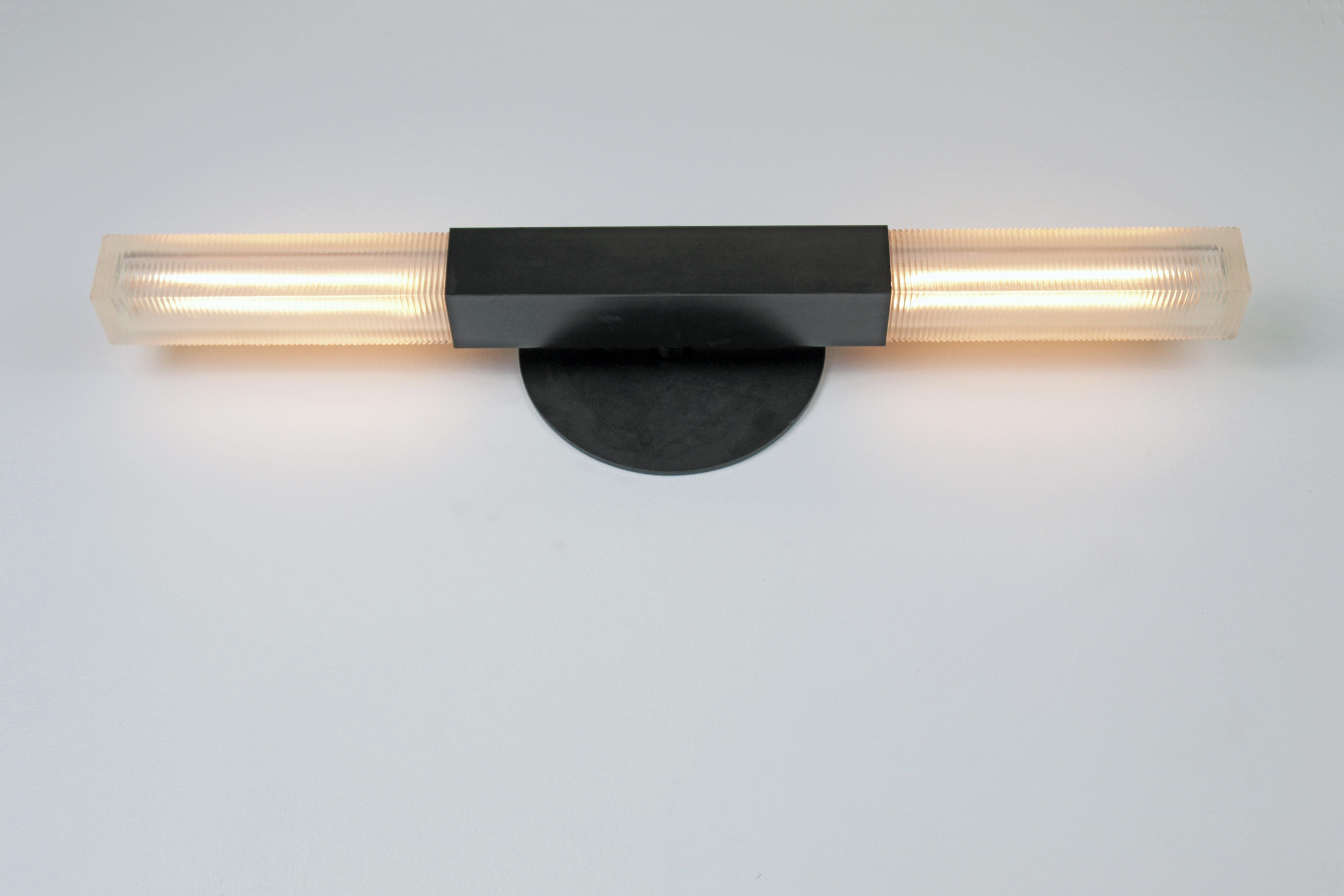 Daikon Studio  POST  Duo Sconce 

The Duo Sconce celebrates the poetic dialogue between light and form to create a fixture that leans into the timeless and iconic. Meticulously crafted by hand in our studios. Horizontal or vertical