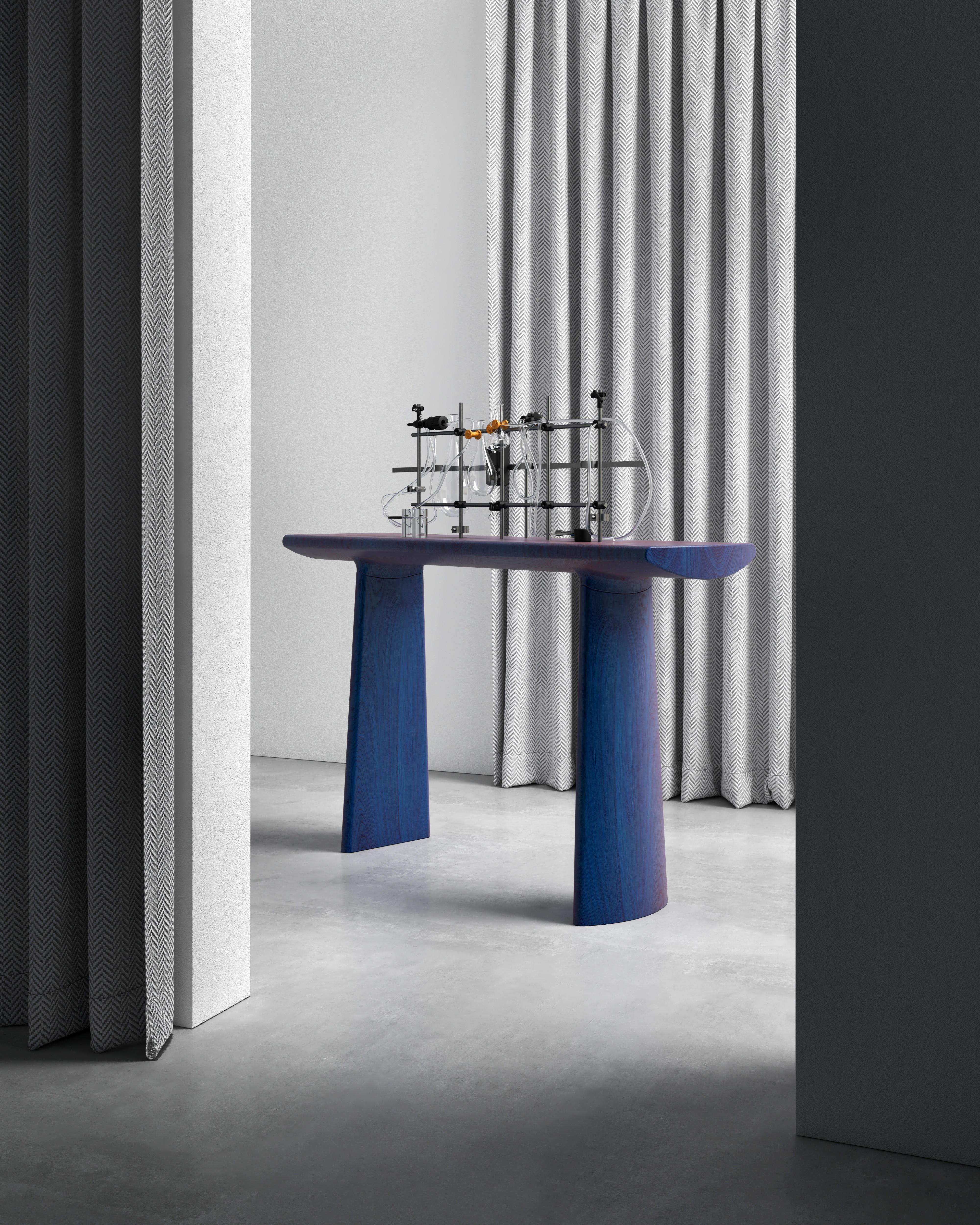 Daiku Console is presented by by Victoria Magniant for Galerie V

The Daiku collection is a serie of eco-designed pieces inviting simplicity. The surface is deeply sanded to create fluid shapes and finished with rich water based stain to expose the