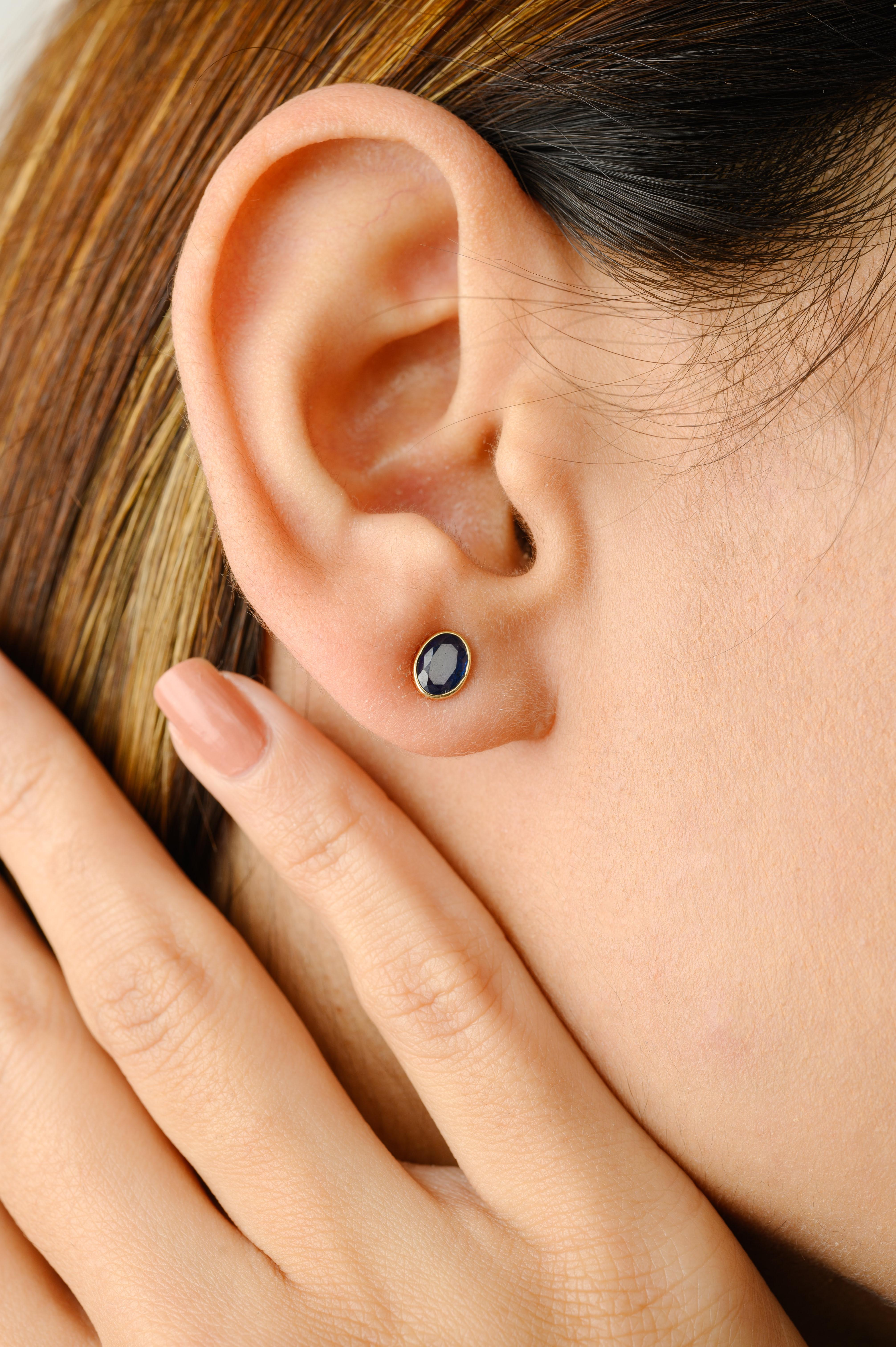 Oval Cut Dainty 1.34 Carat Bezel Set Blue Sapphire 14k Yellow Gold Stud Earrings Gift For Sale