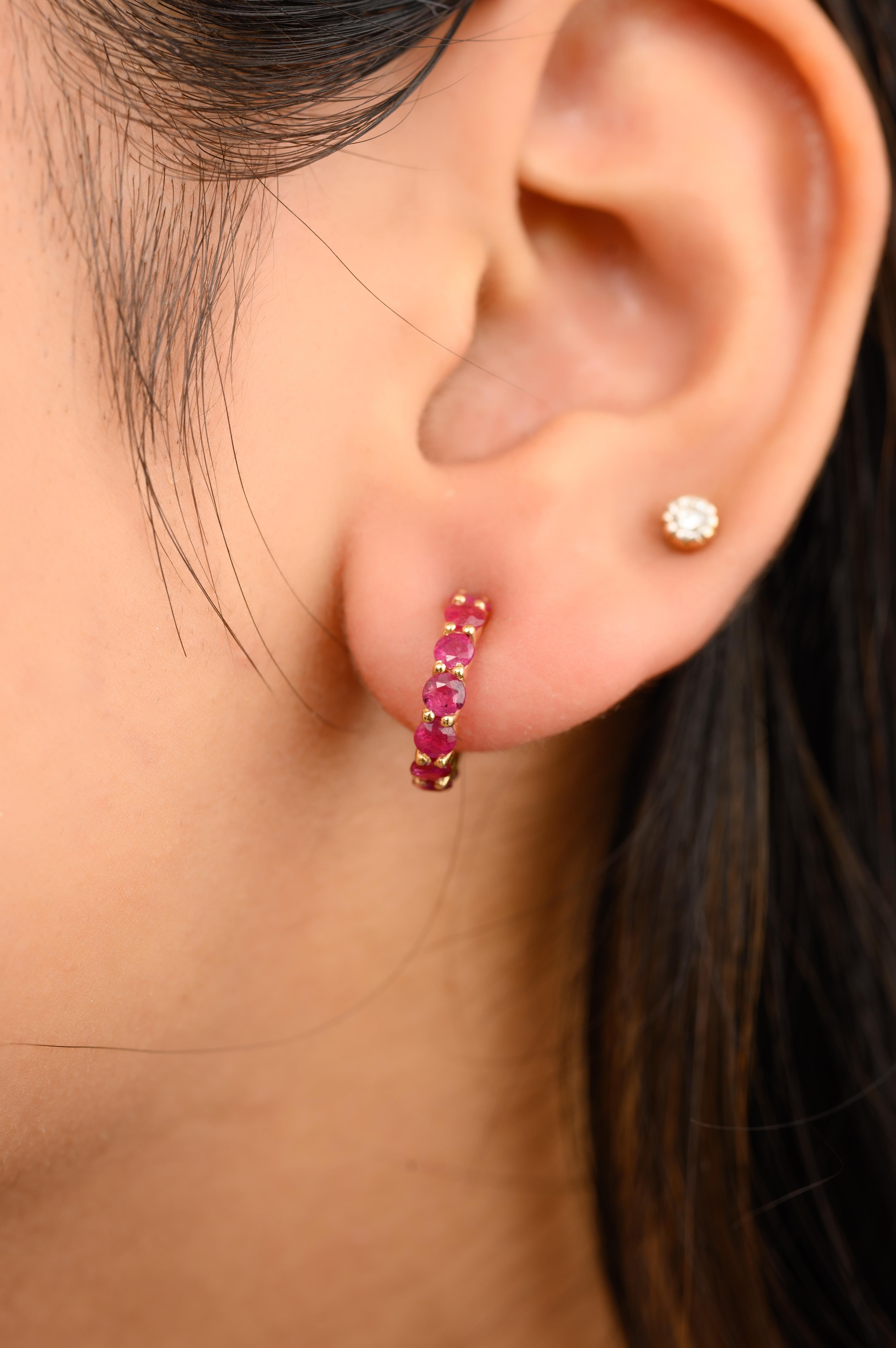 Dainty Ruby Huggie Hoop Earrings in 18K Gold to make a statement with your look. You shall need hoop earrings to make a statement with your look. These earrings create a sparkling, luxurious look featuring round cut ruby.
Ruby improves mental