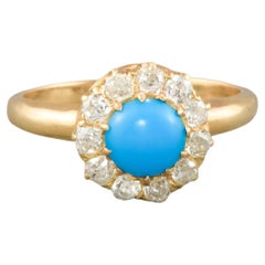 Magnifique bague en turquoise ancienne avec halo de diamants taille vieille mine et fervents diamants