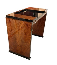 Dainty Art Deco desk France around 1925. Root wood and black lacquer.