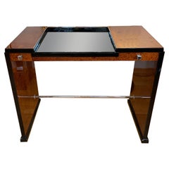 Dainty Art Deco desk  France around 1925. Root wood and black lacquer.