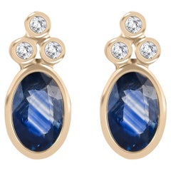 Zierliche blaue Saphir-Diamant-Ohrstecker aus massivem Gelbgold 14k